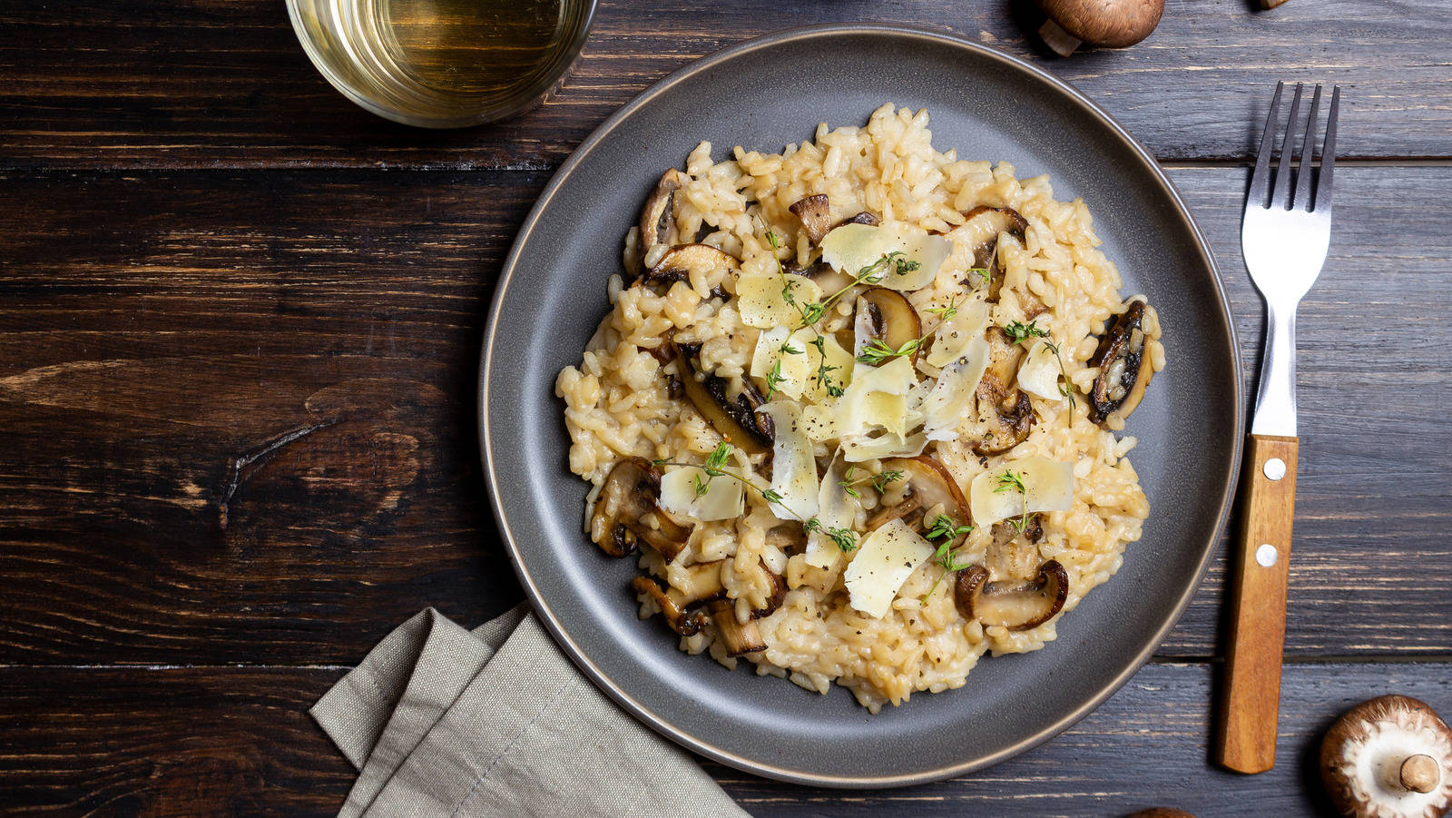 Delectable Mushroom Risotto Garnished To Perfection Background