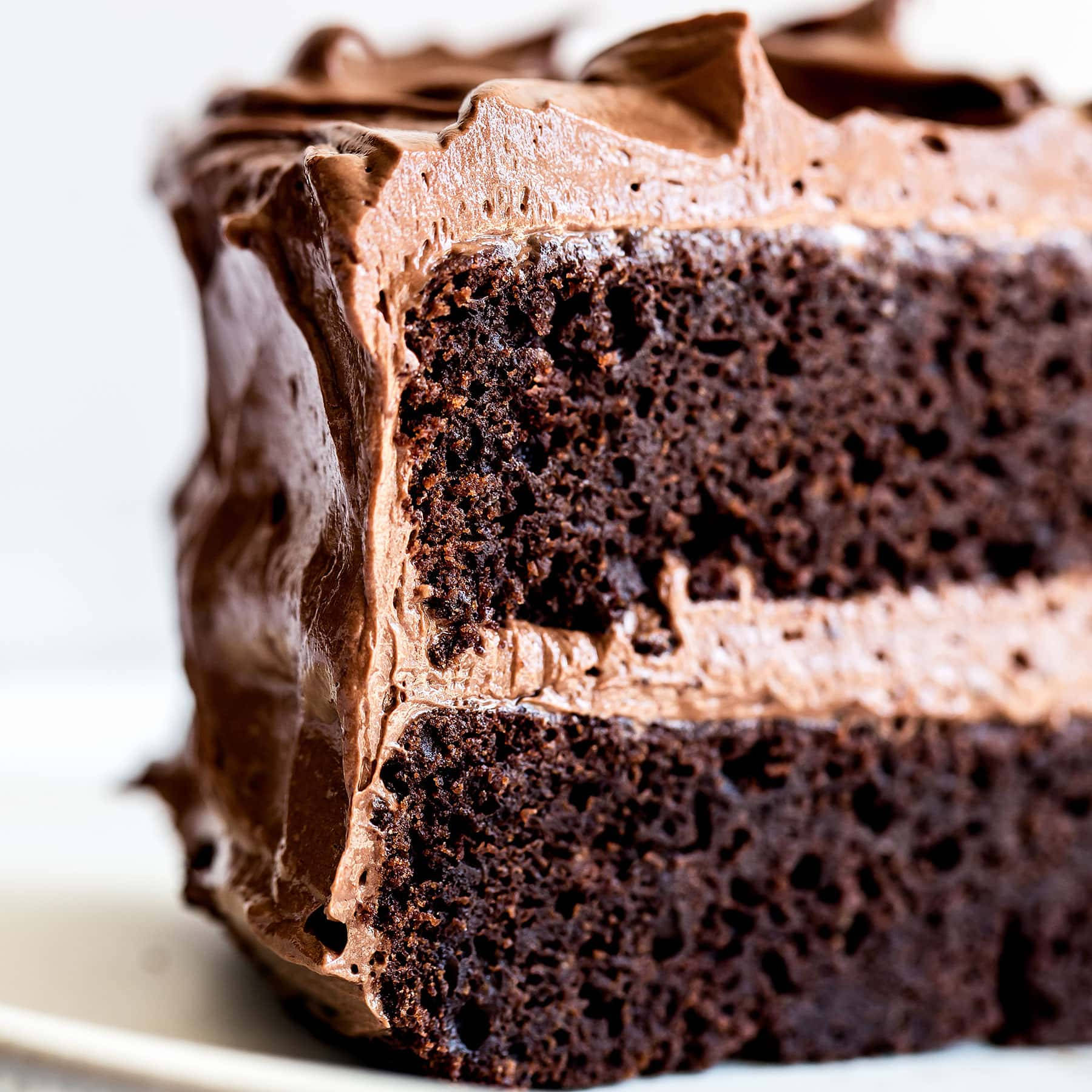 Delectable Slice Of Moist Chocolate Cake Background