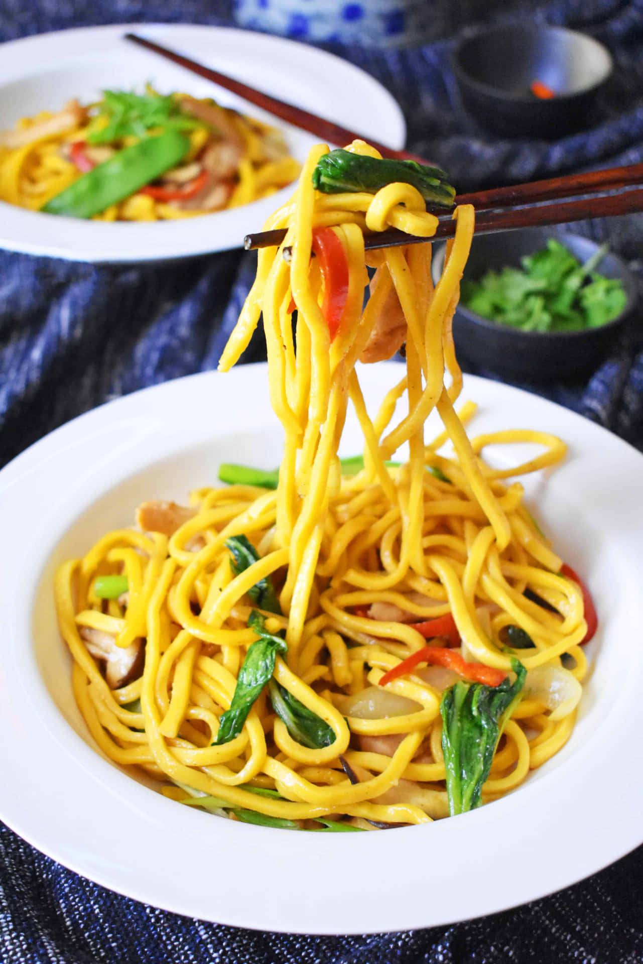 Delectable Stir-fried Hokkien Mee Showcasing A Mix Of Vibrant Ingredients Background