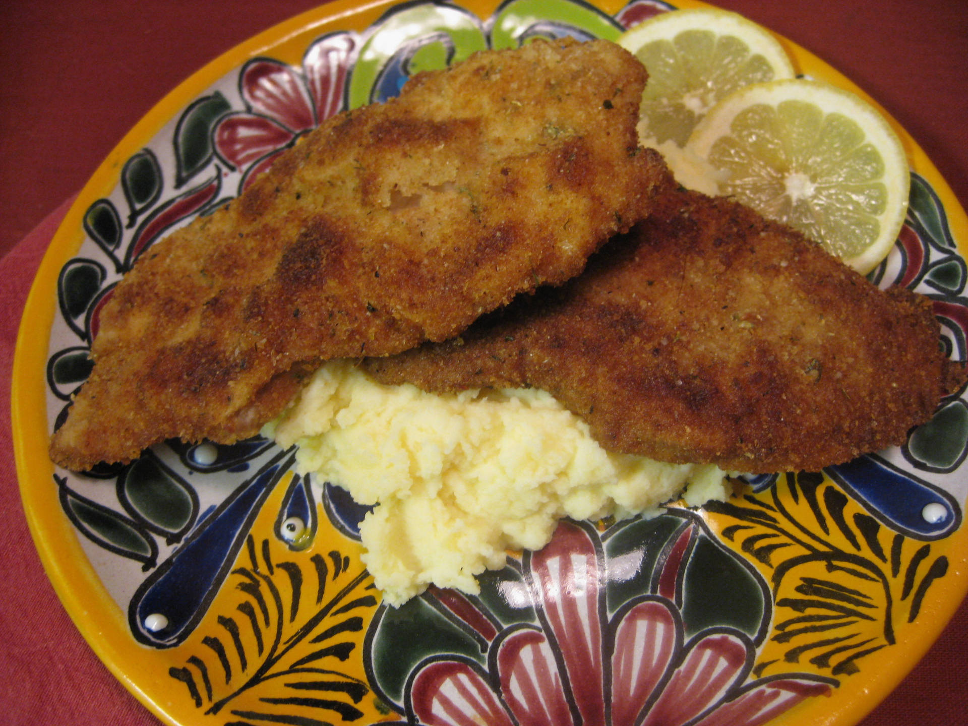 Delectable Wiener Schnitzel Served With Creamy Mashed Potatoes. Background