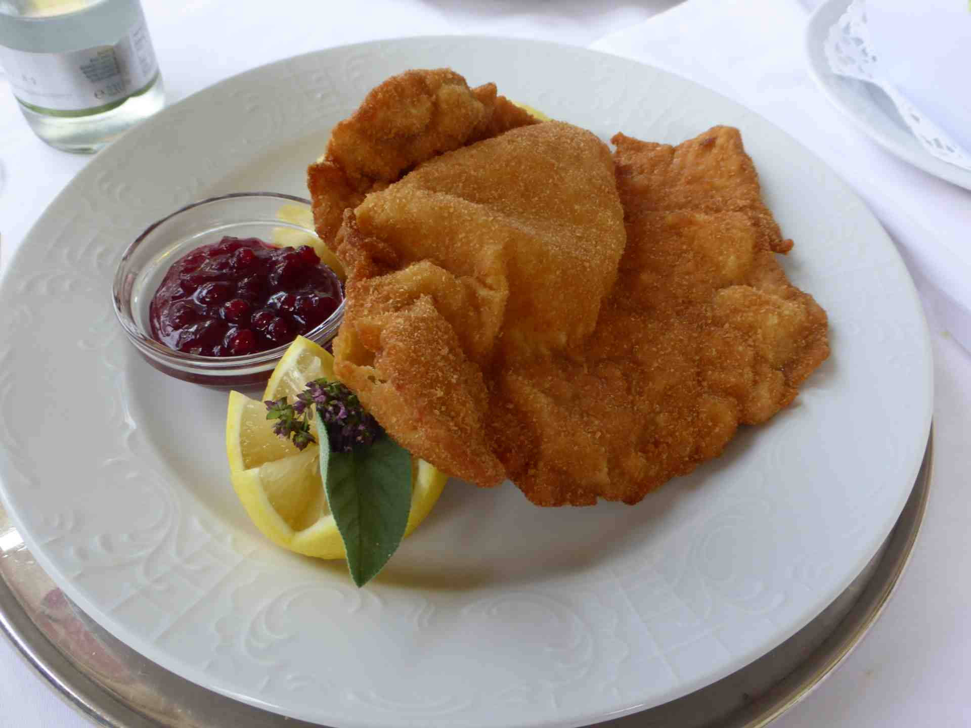 Delectable Wiener Schnitzel With Tangy Cranberry Sauce Background