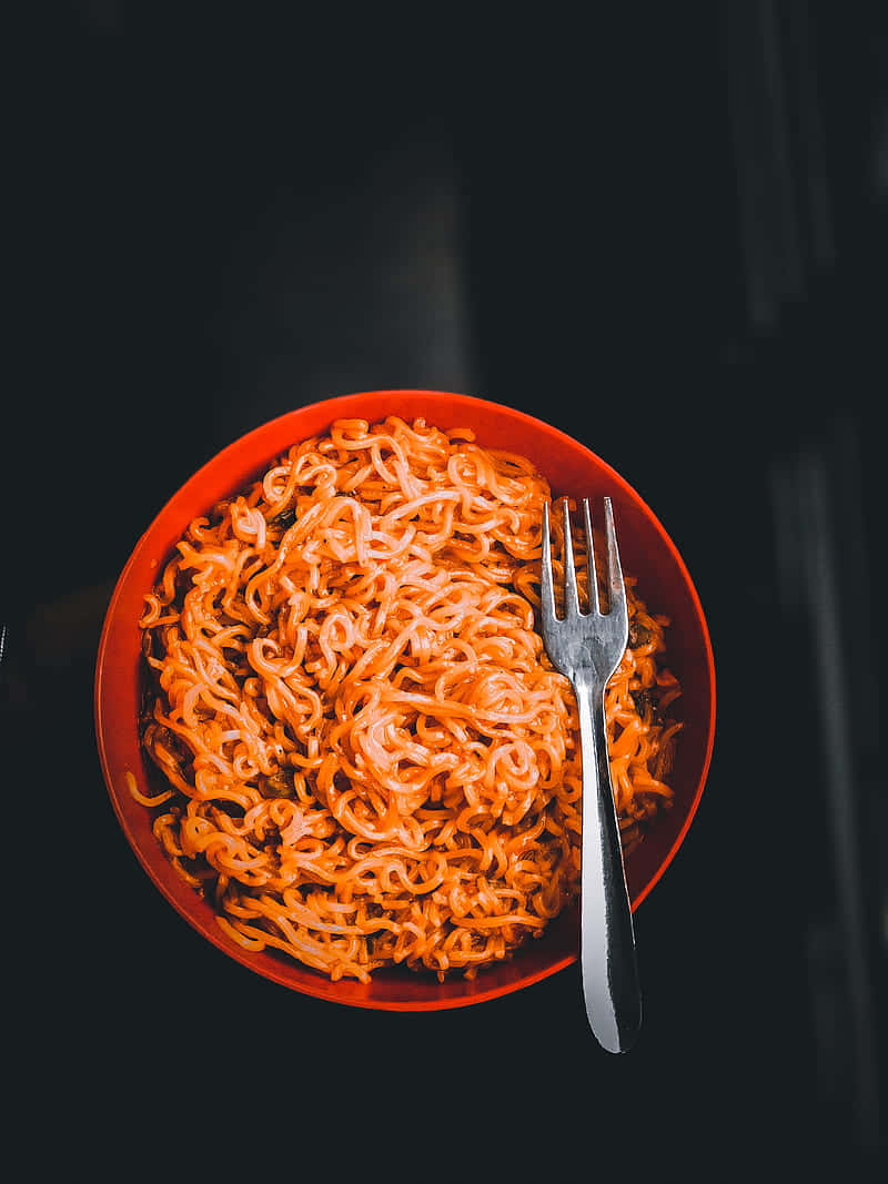 Delectable Yippee Instant Noodles In Red Bowl Background