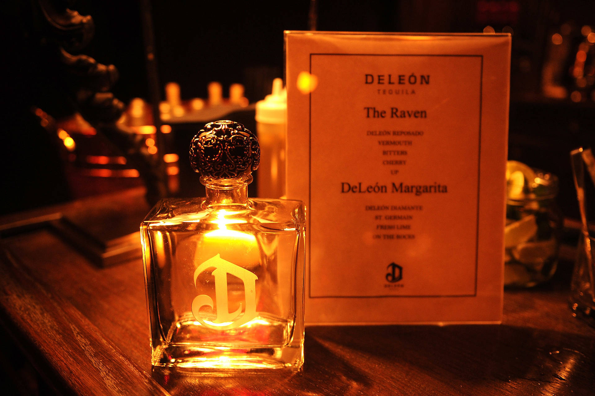 Deleón Tequila Bottle With Bar Menu Background