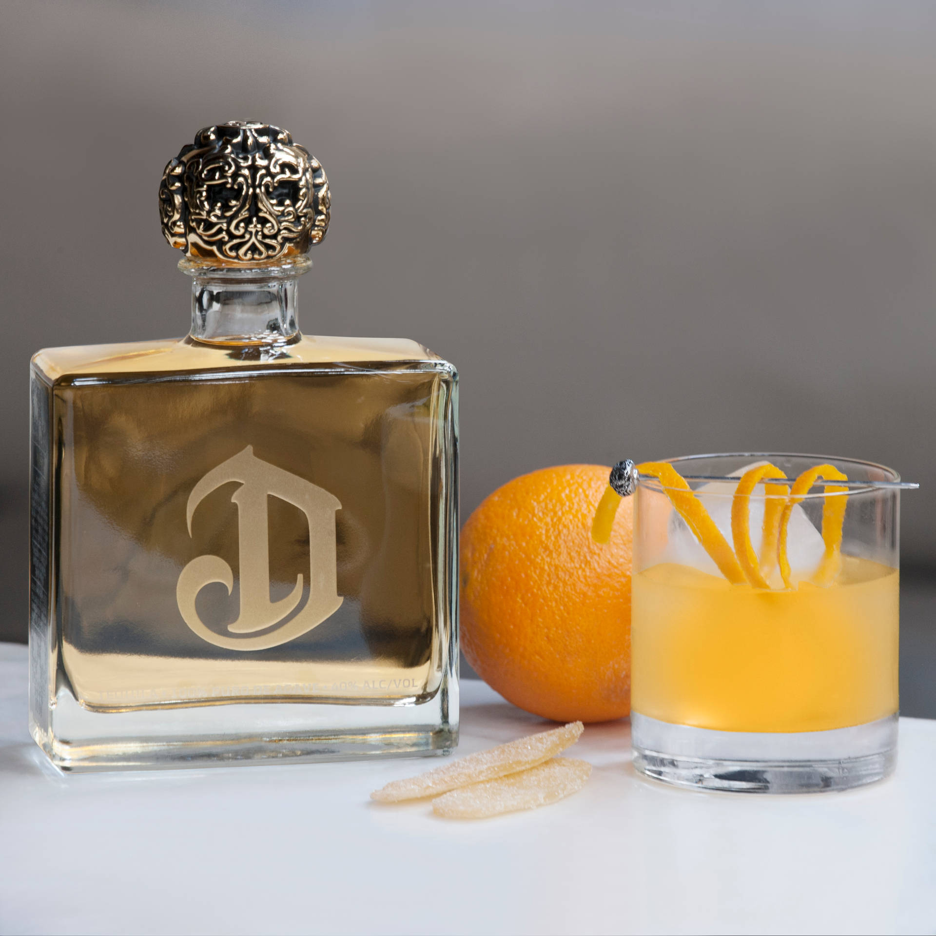 Deleón Tequila Drink With Orange Fruit