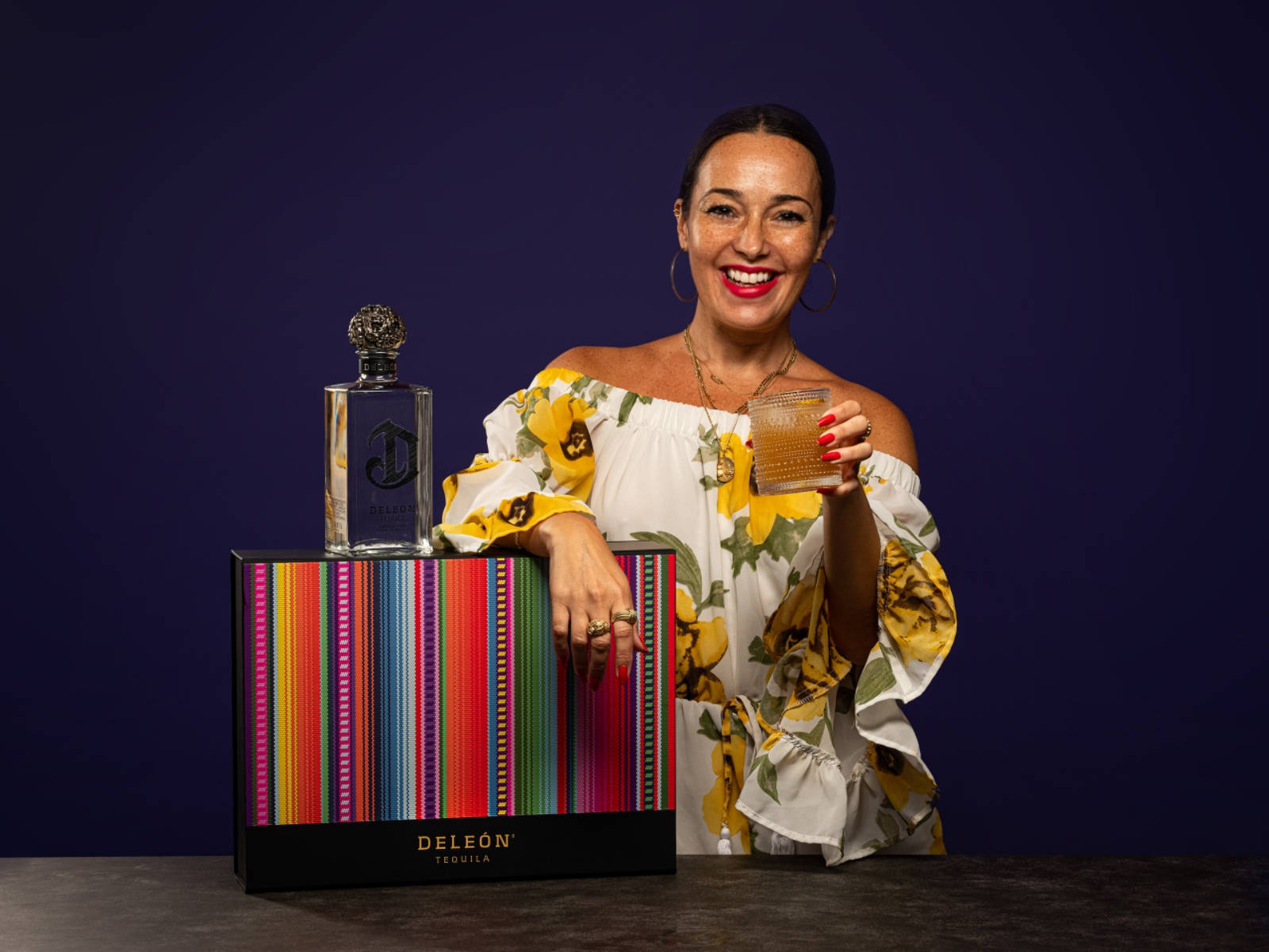 Deleón Tequila With A Smiling Lady