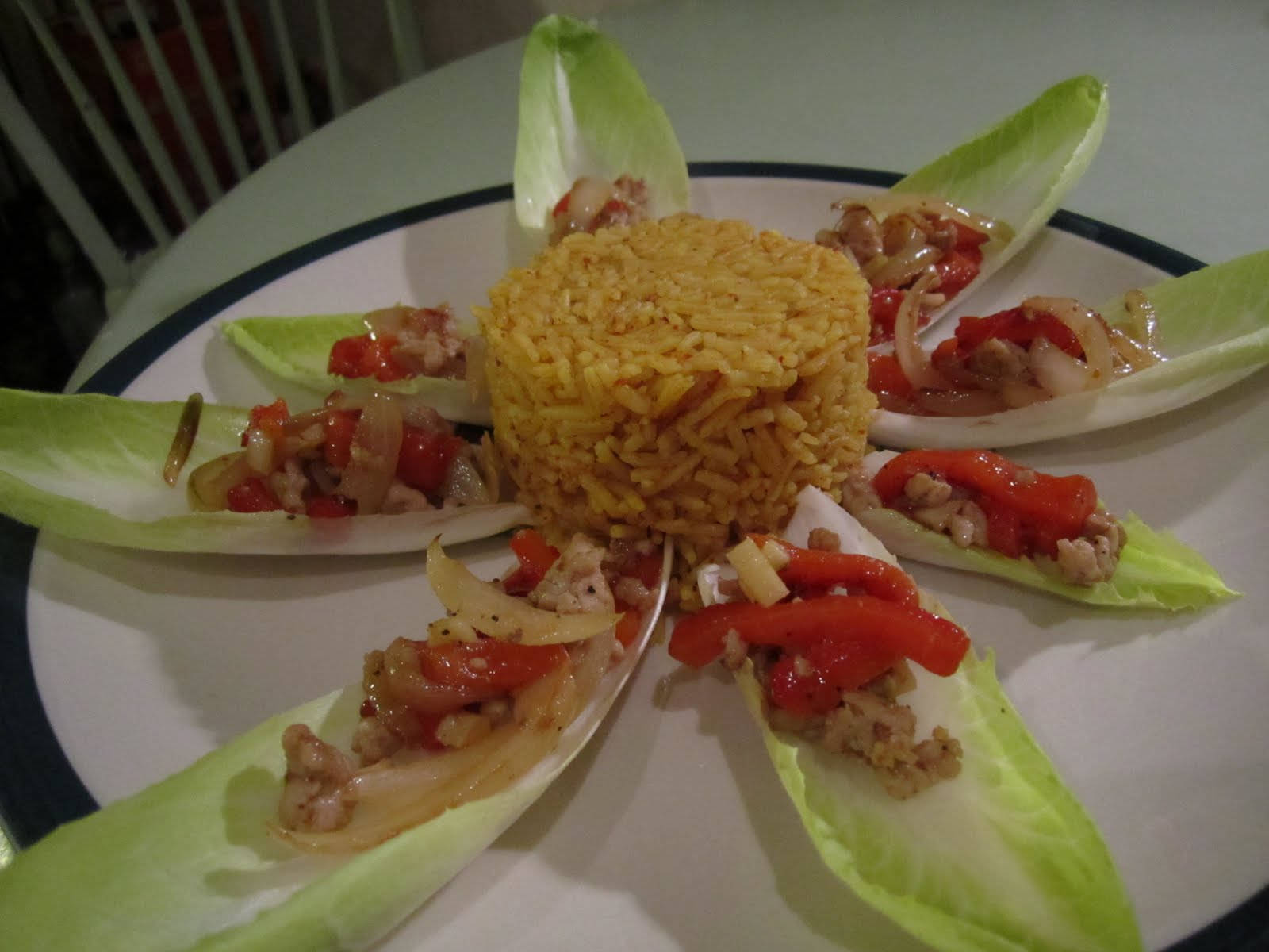 Delicate Stuffed Endive Served With Lava Rice Background