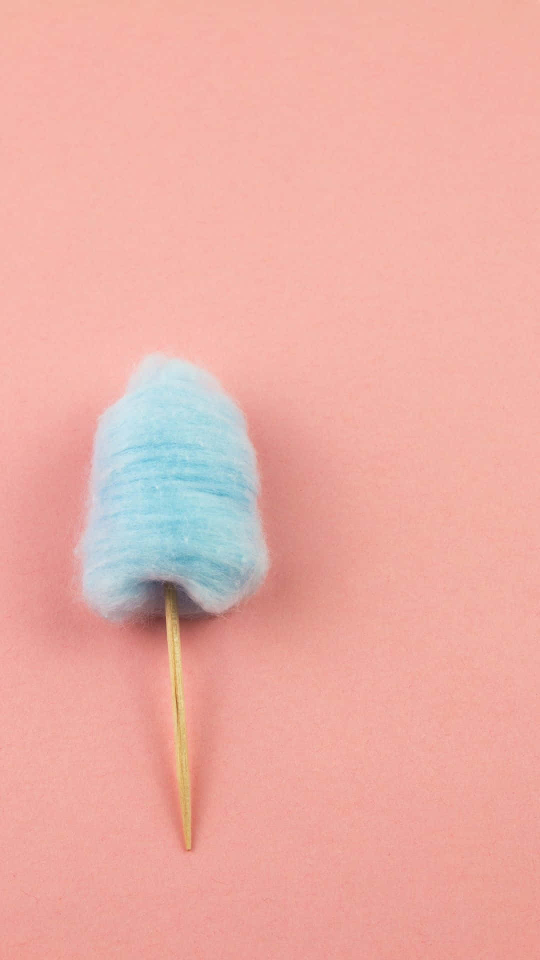 Delicious And Fluffy Cotton Candy On A Stick Background