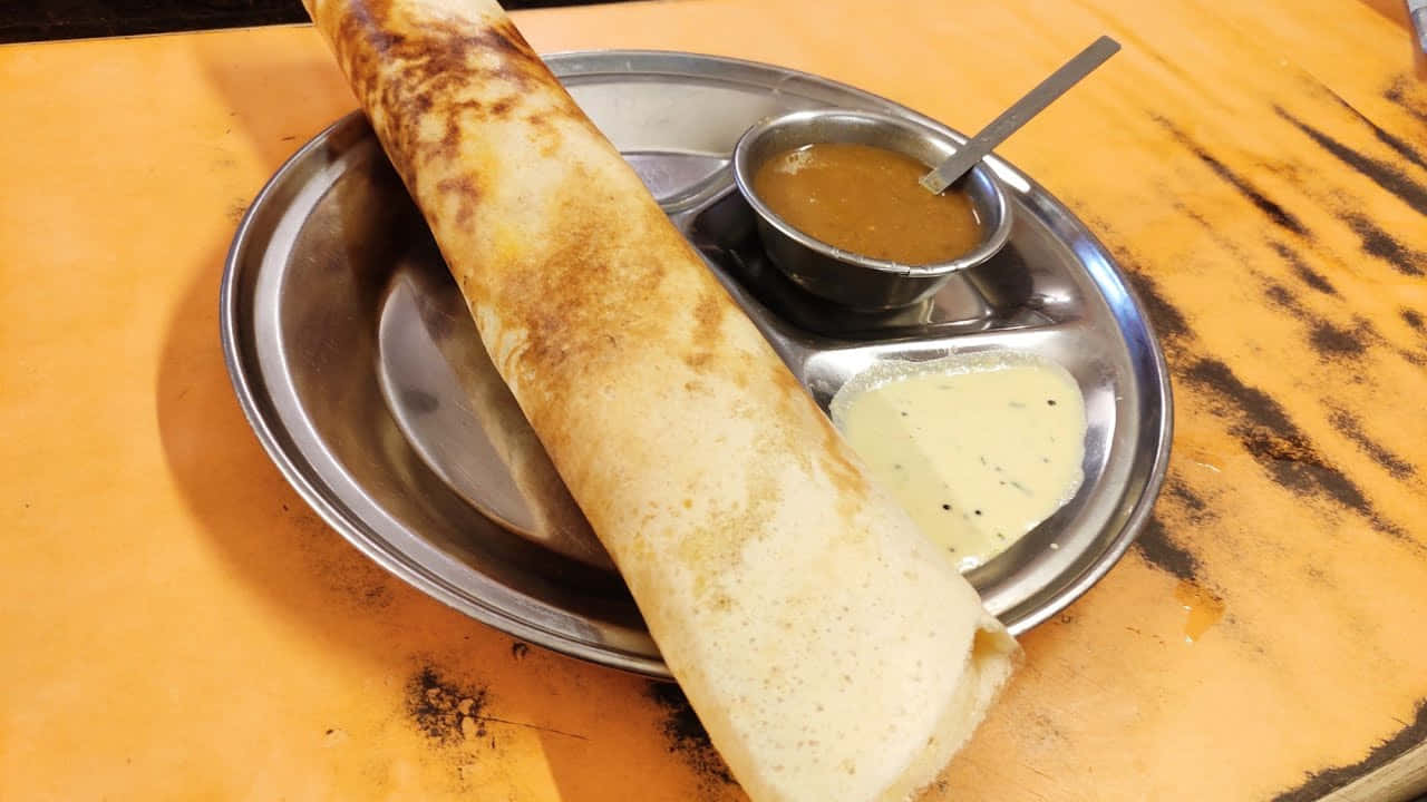 Delicious And Nutritious Indian Cuisine: Crispy Dosa Background