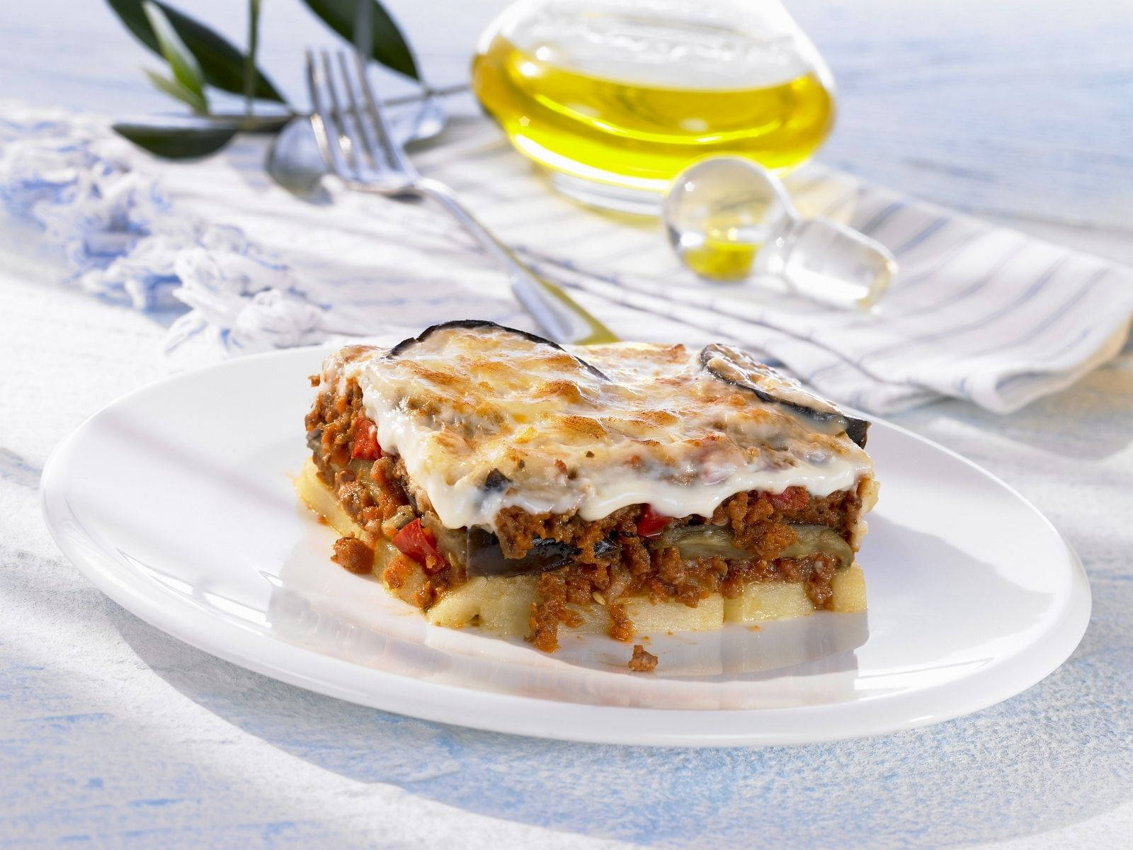 Delicious Baked Moussaka Topped With Creamy Meat Sauce