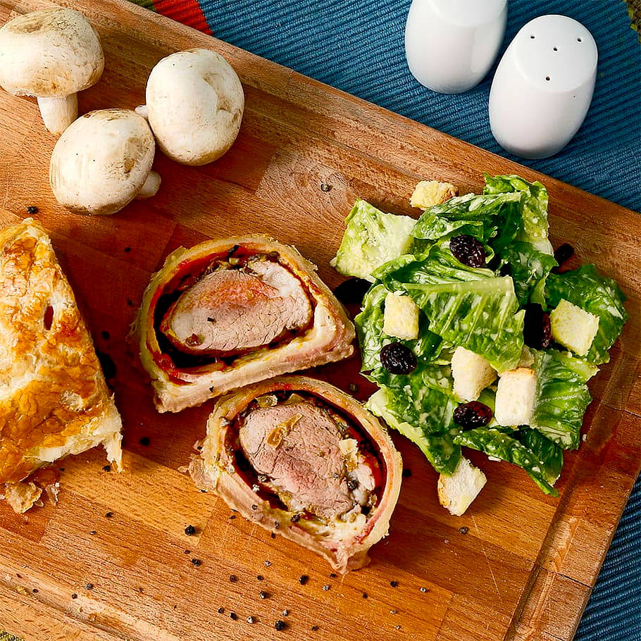 Delicious Beef Wellington With Fresh Salad And Mushrooms