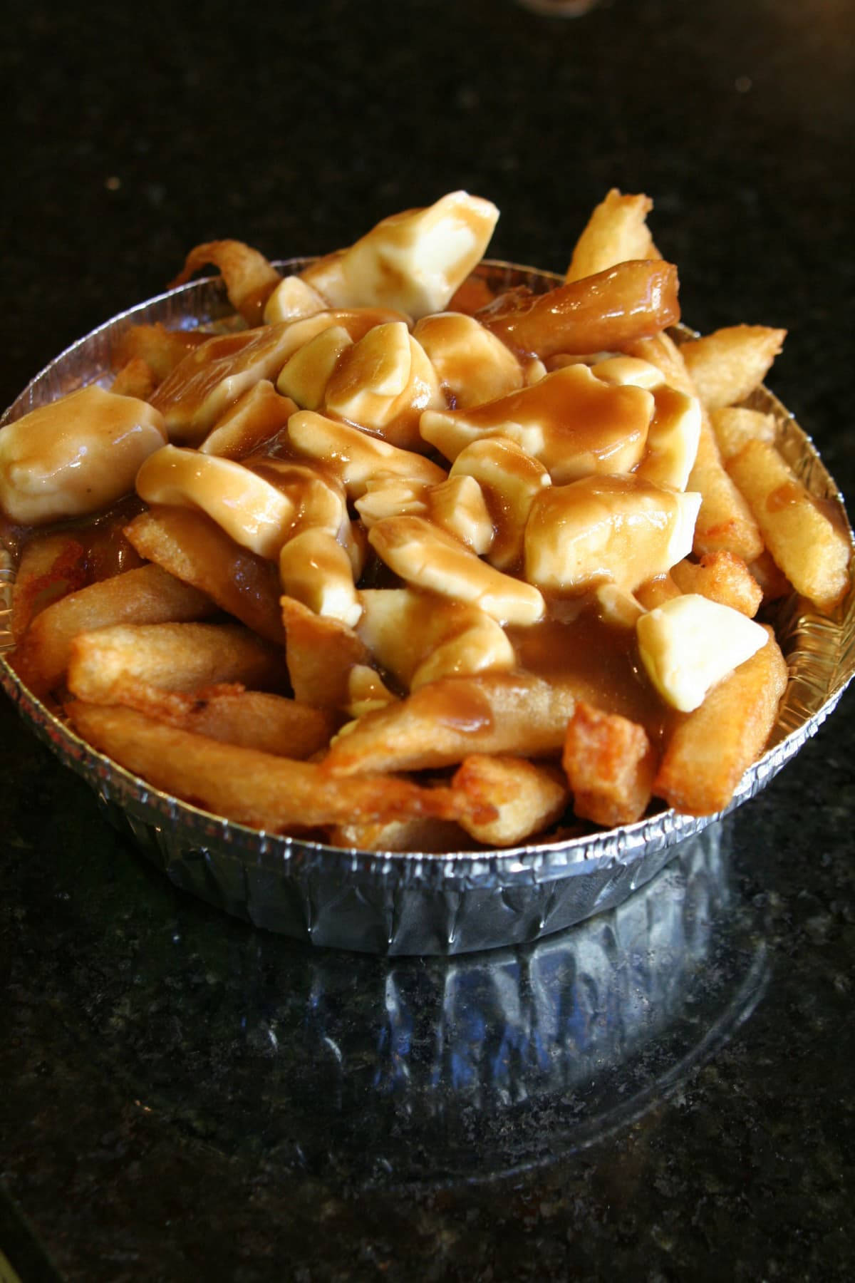 Delicious Bowl Of Canadian Poutine Background