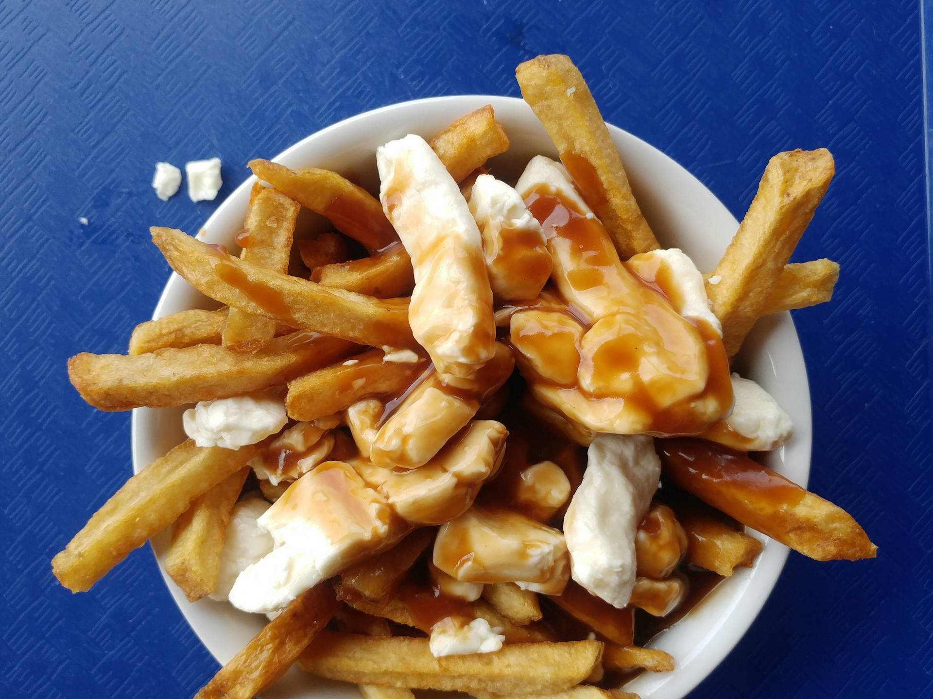 Delicious Bowl Of Homemade Poutine Background