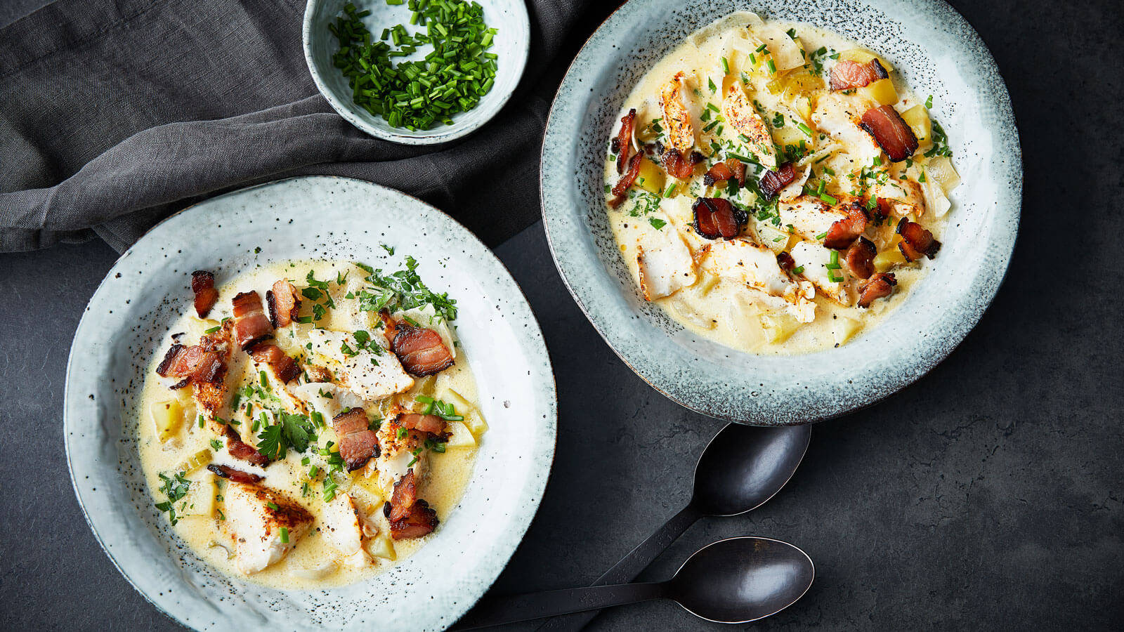 Delicious Bowls Of New England Clam Chowder Background