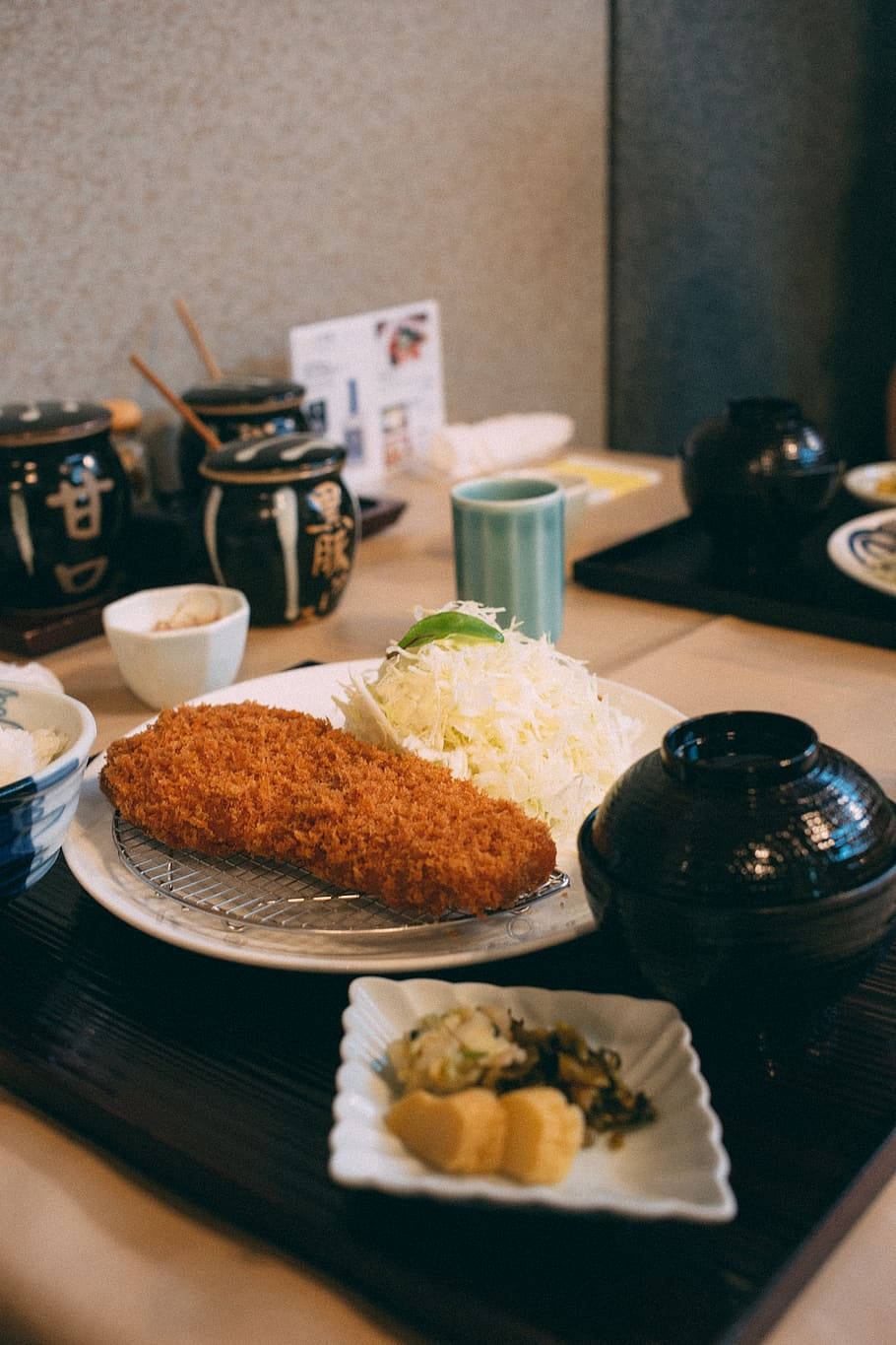 Delicious Breaded Tonkatsu Dish In A Japanese Setting Background