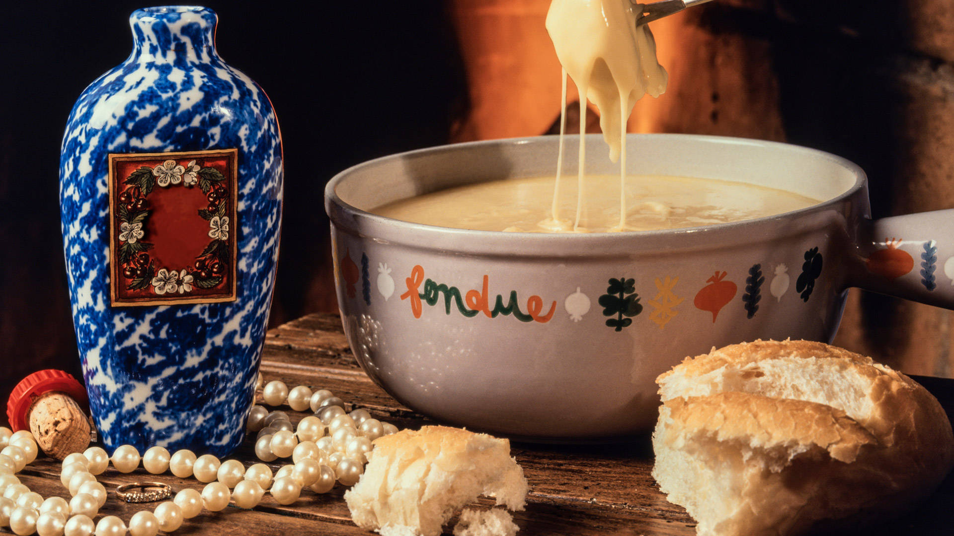 Delicious Cheese Fondue With Fresh Baked Bread Background