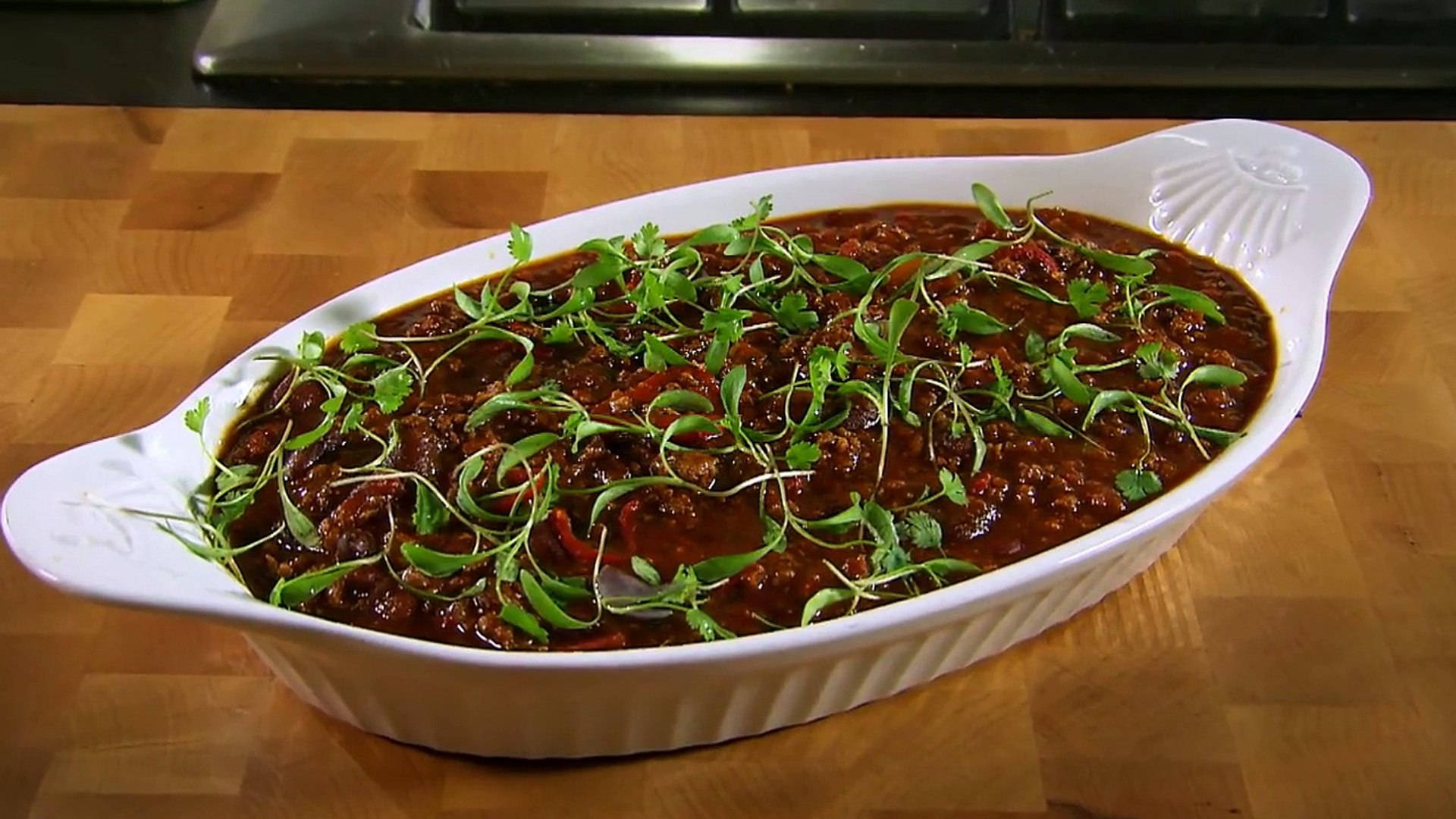 Delicious Chili Con Carne With Celery Leaves Background