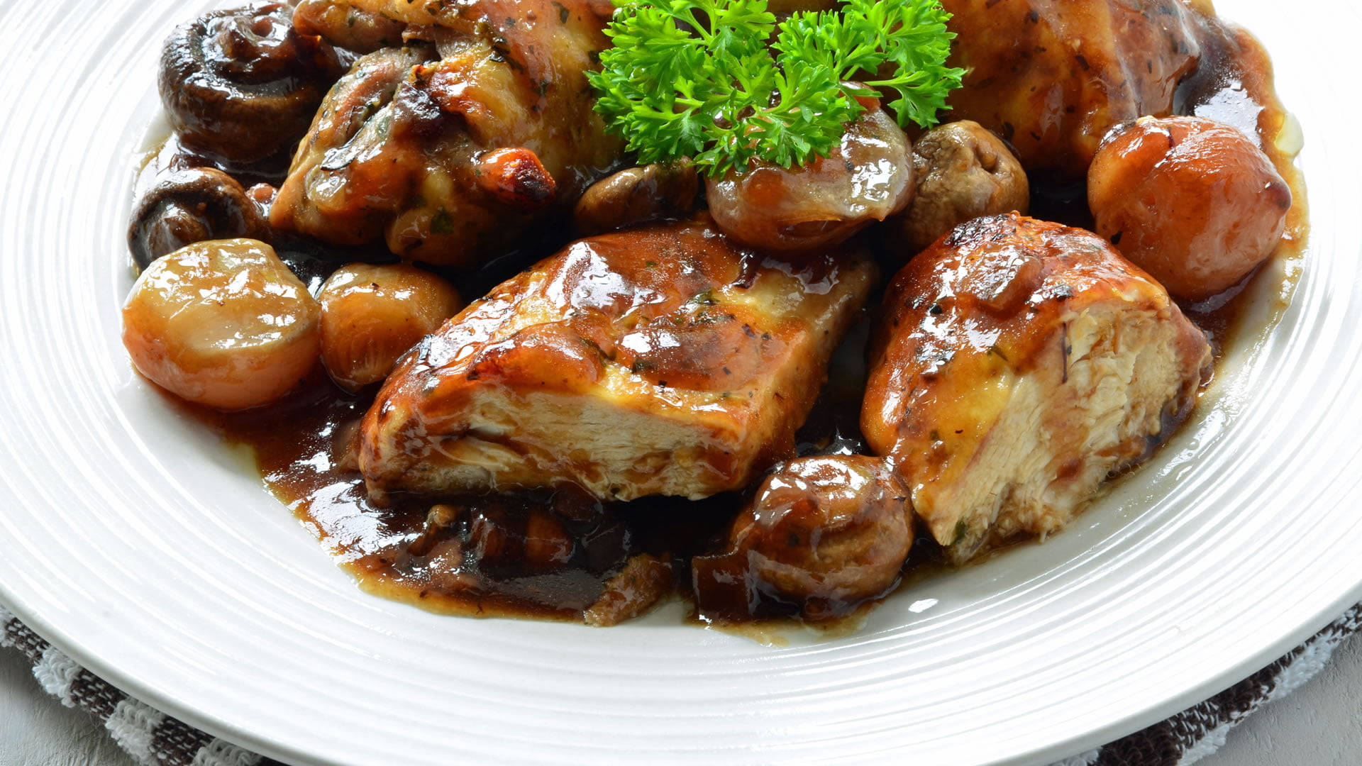 Delicious Coq Au Vin Adorned With Fresh Parsley