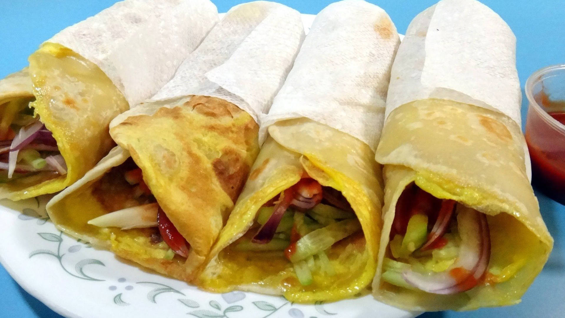 Delicious Egg Rolls Wrapped To Perfection Background