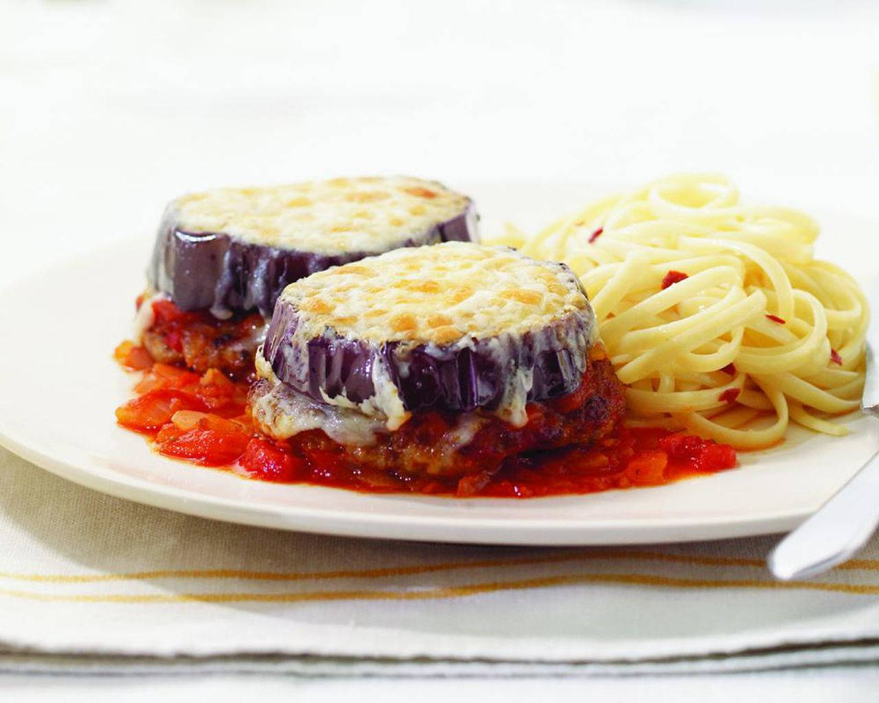 Delicious Eggplant Parmigiana With Cheese Sauce & Pasta Background