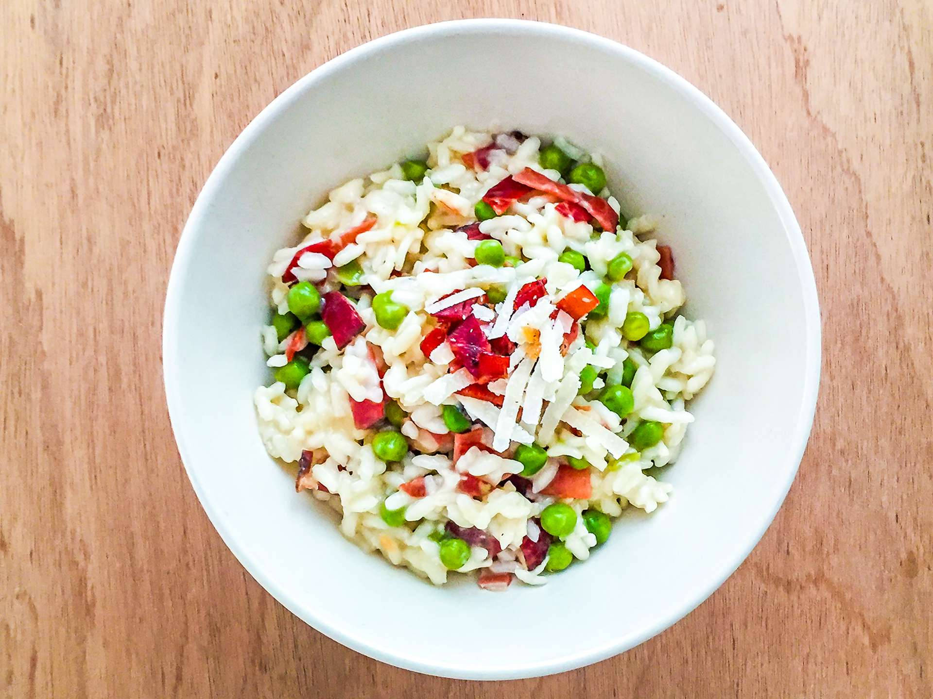 Delicious Ham And Peas Risotto Dish Background