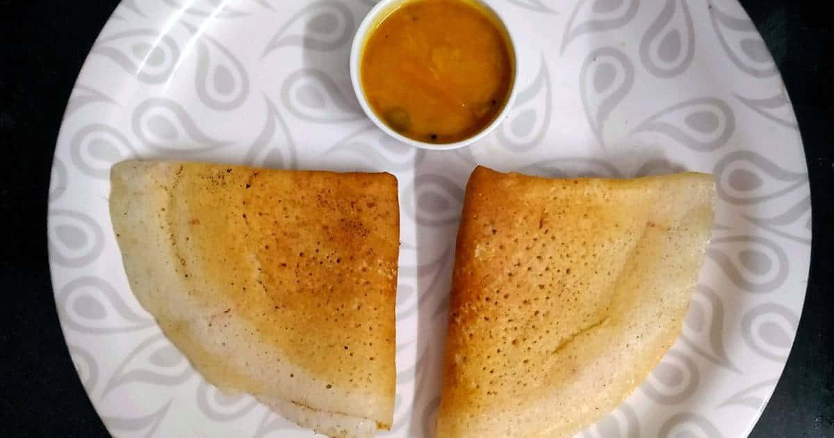 Delicious Homemade Indian Dosa Ready To Be Savored Background