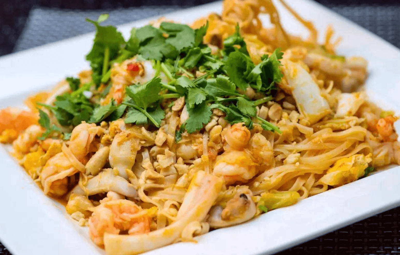 Delicious Pad Thai Noodles With Fresh Coriander Background