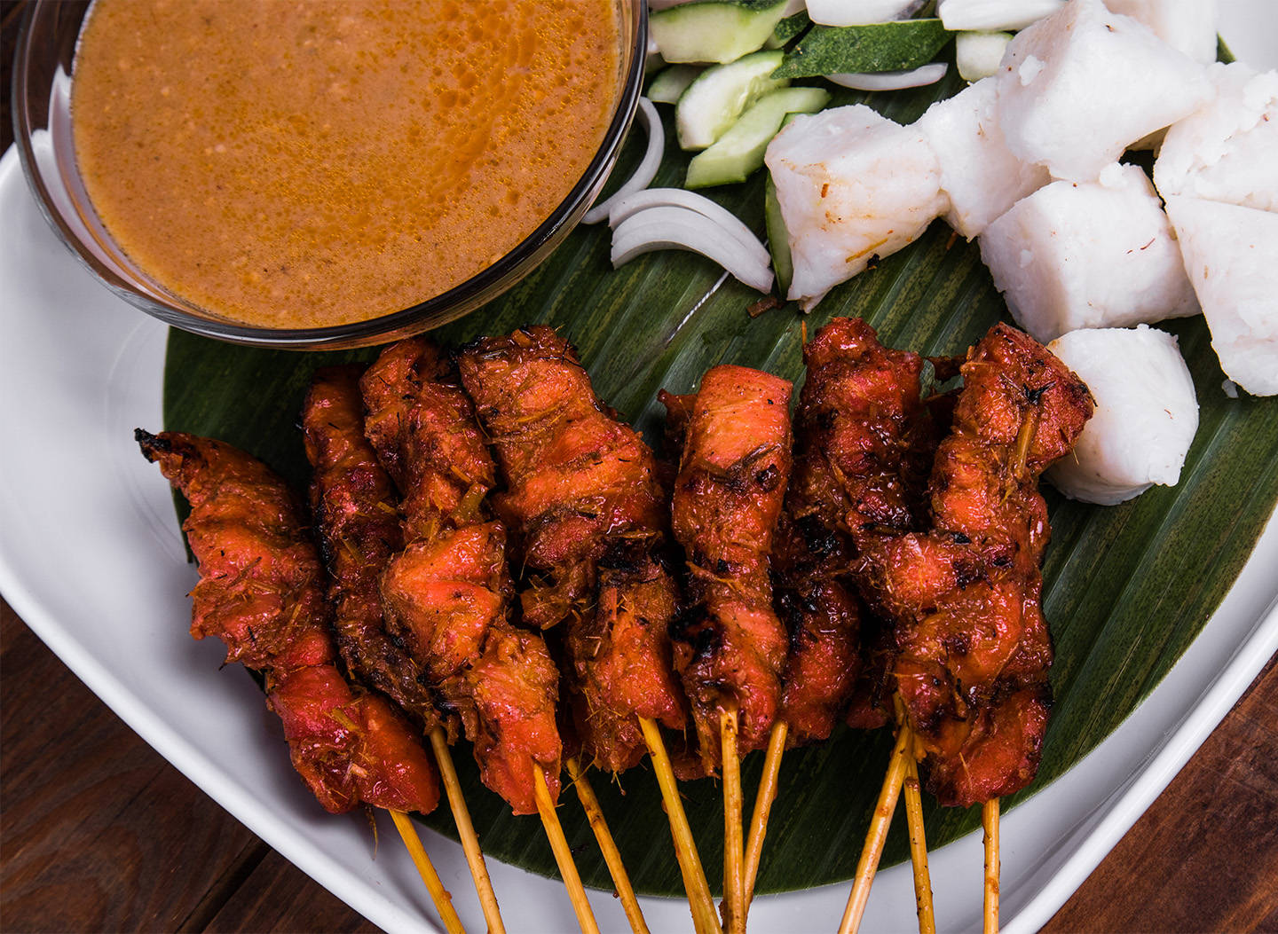 Delicious Pork Satay With Rice Cake Background