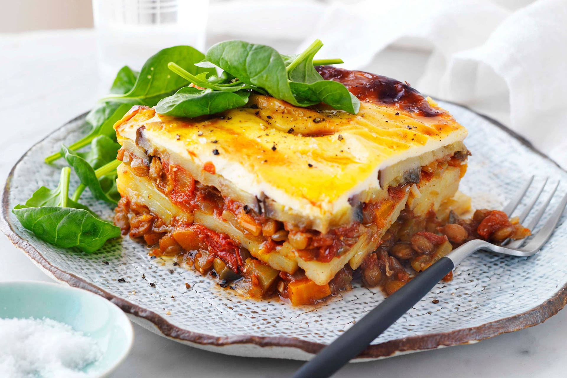 Delicious Portioned Moussaka With Veggies & Meat Background