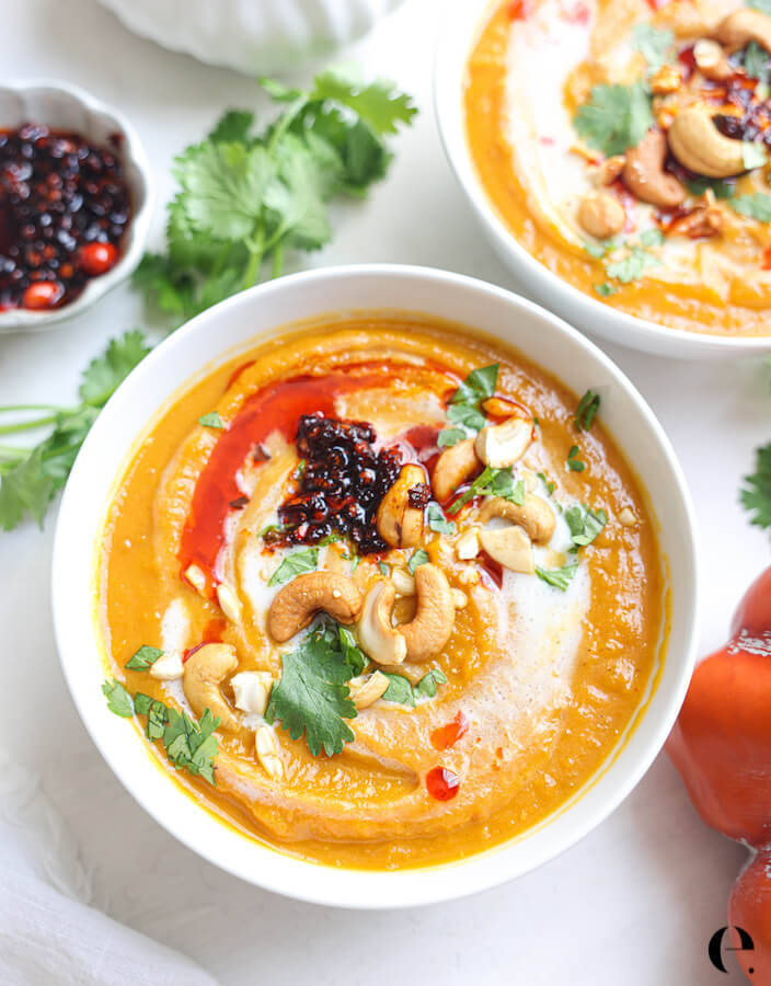 Delicious Pumpkin Soup With Crunchy Cashew Topping Background