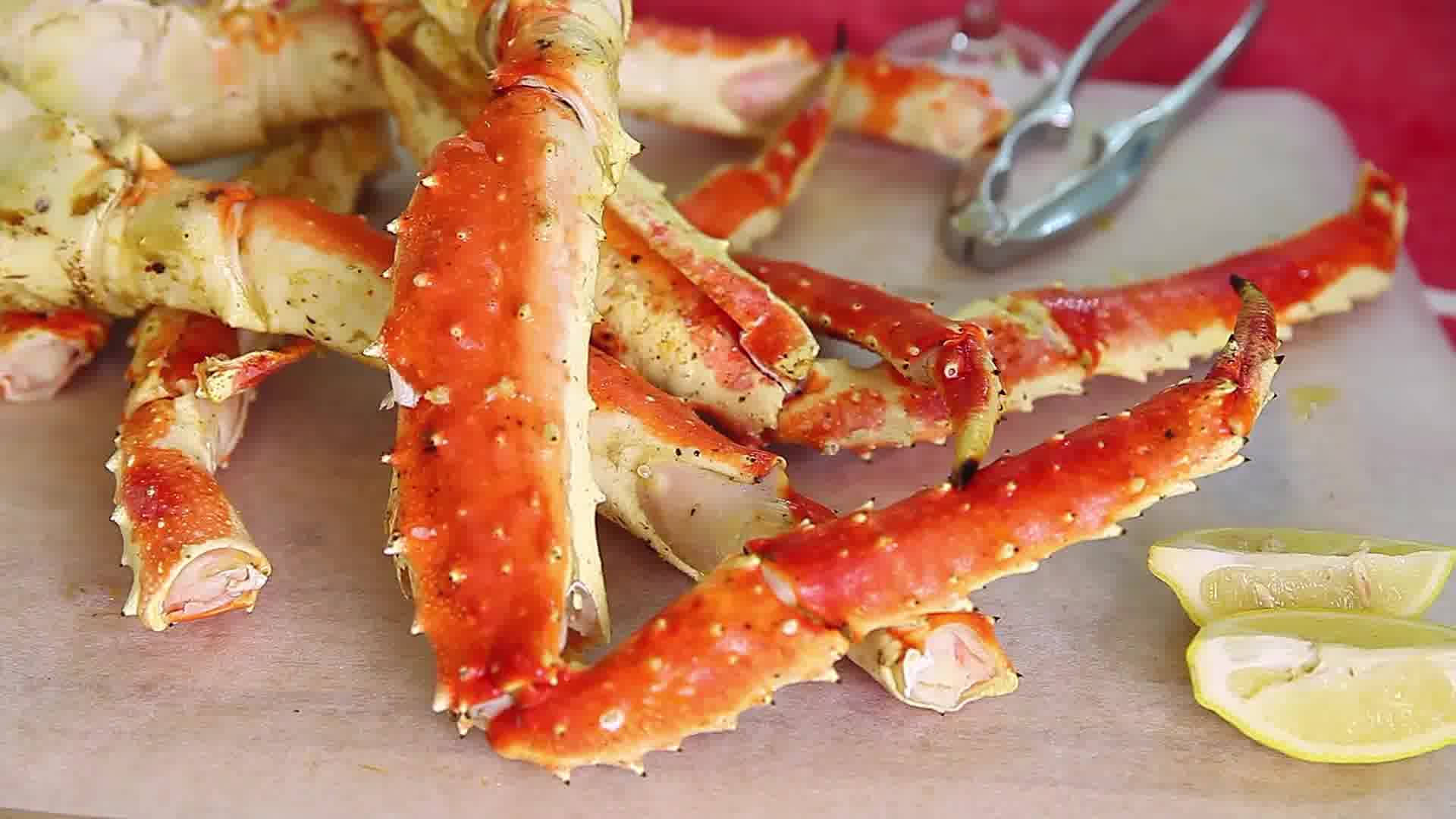 Delicious Red King Crab Freshly Cracked Open On A Serving Plate