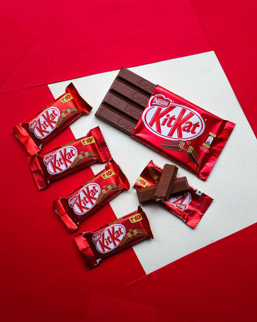 Delicious Red Kit-kat Chocolates Background