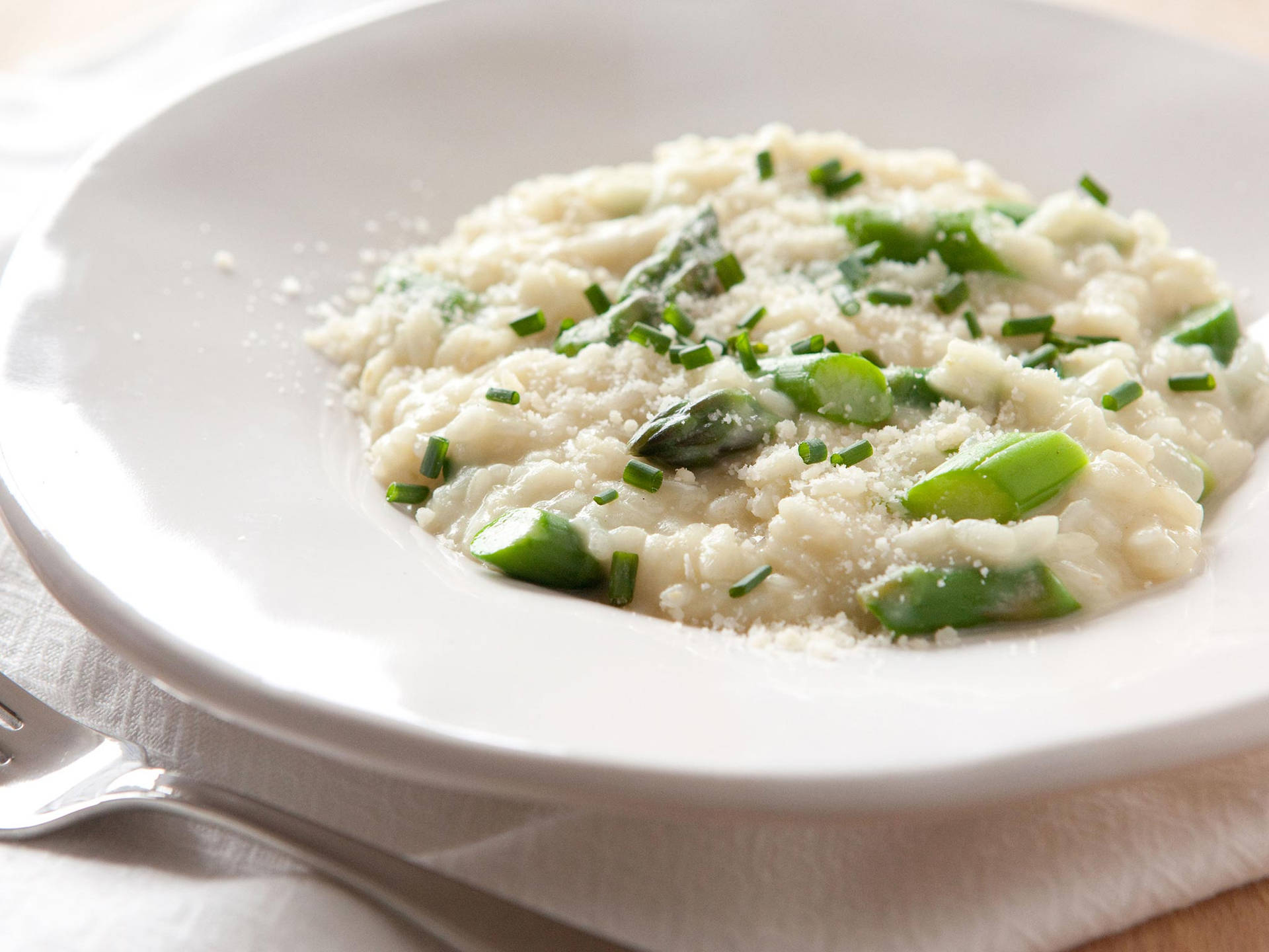 Delicious Risotto Dish With Fresh Celery And Onions Background