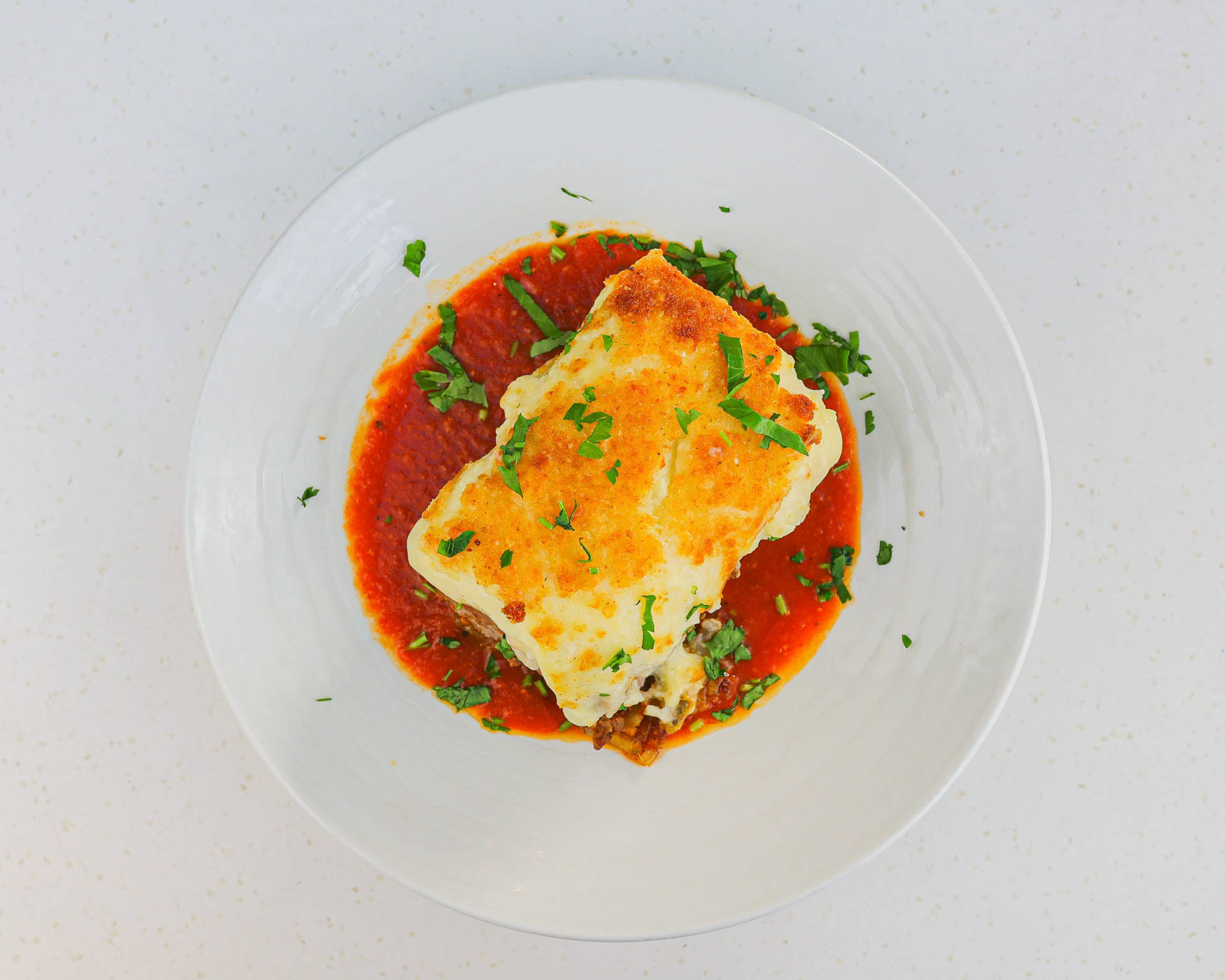 Delicious Serving Of Traditional Moussaka Background