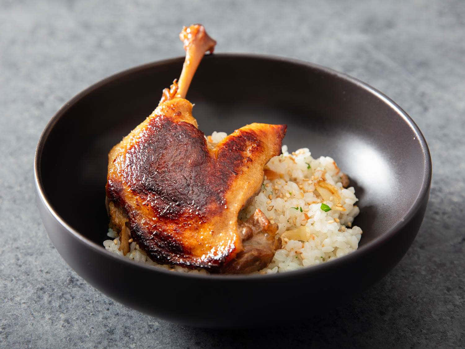 Delicious Singaporean Crispy Koji Duck Rice Confit. Background