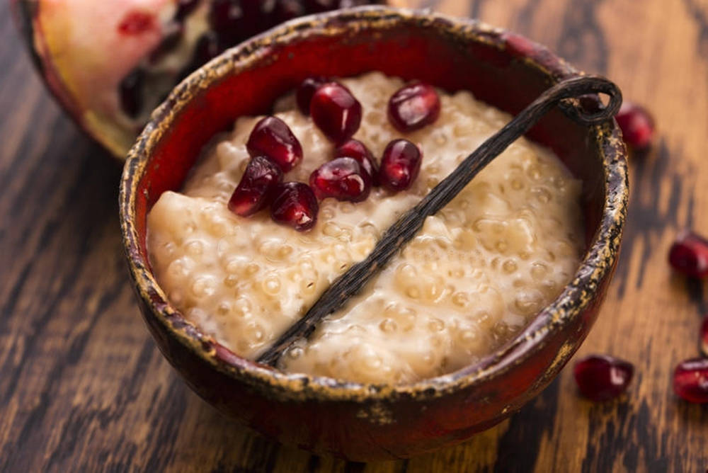 Delicious Tapioca Pudding With Pomegranate Seeds Background