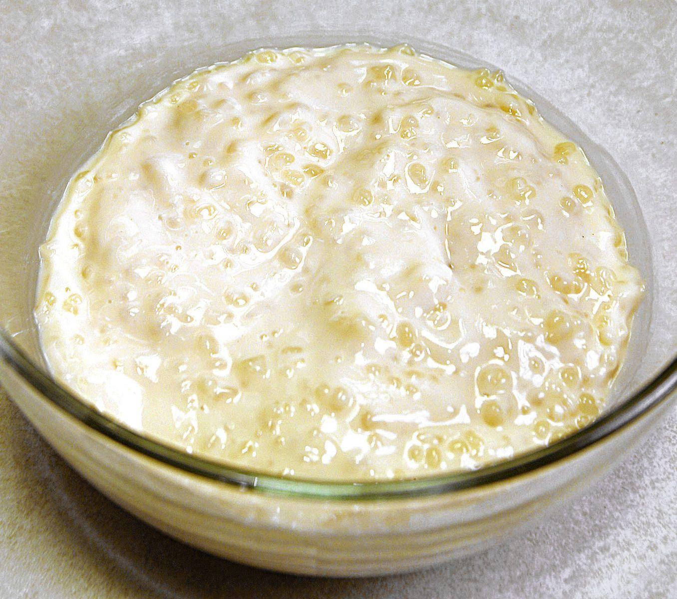 Delicious Tapioca Pudding With White Sauce Background