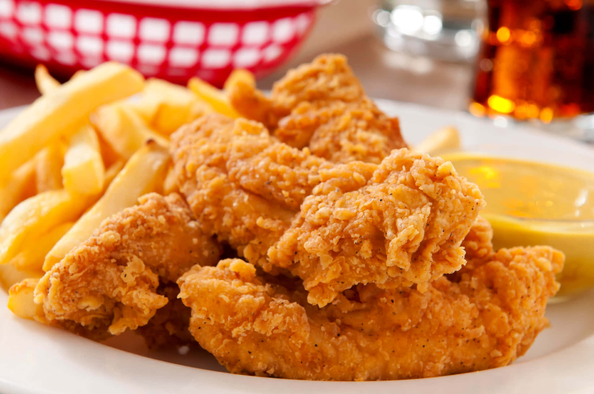 Delicious Tender Chicken And Fries Background