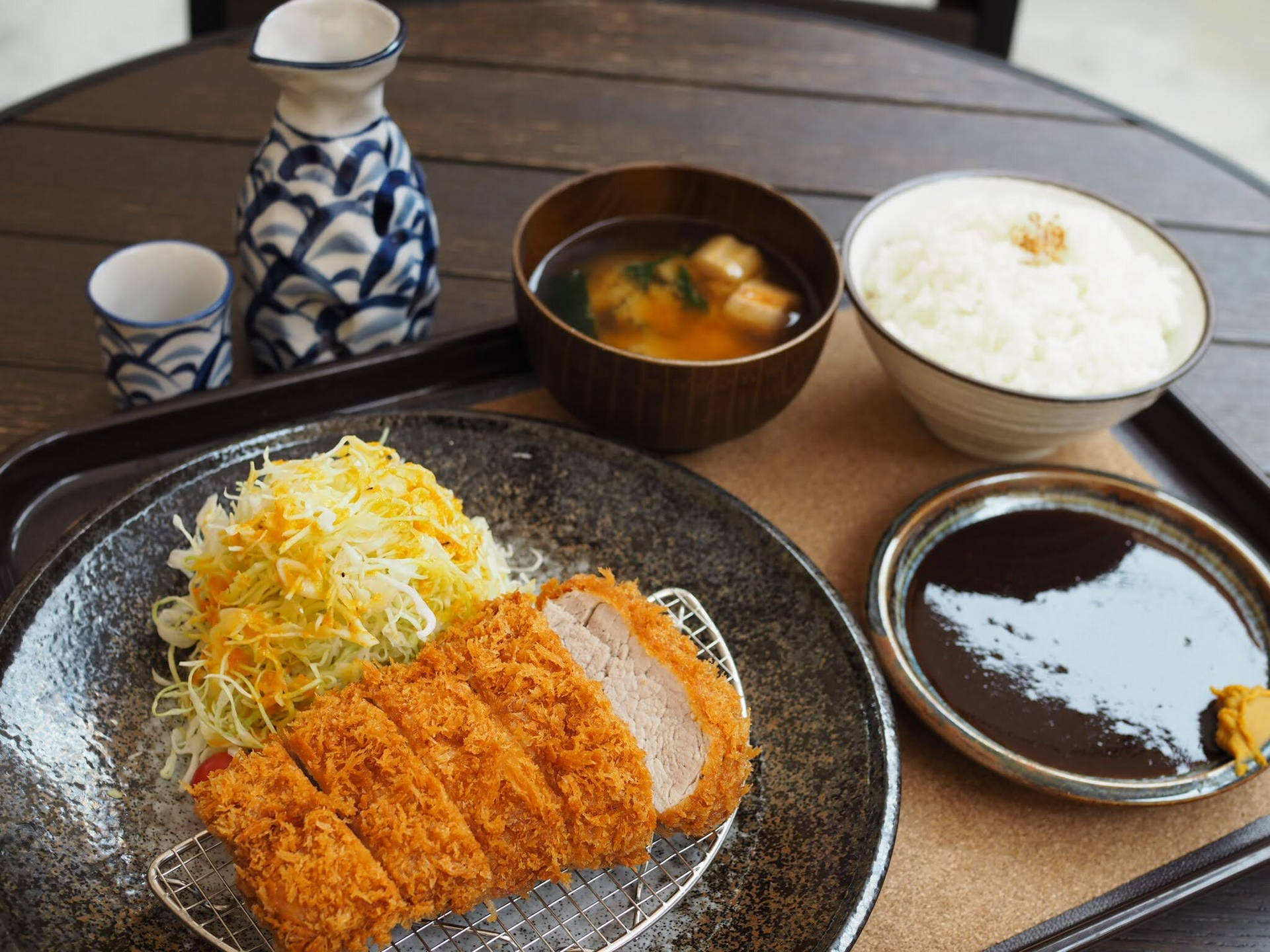 Delicious Tonkatsu Served With Tofu Side Dish Background