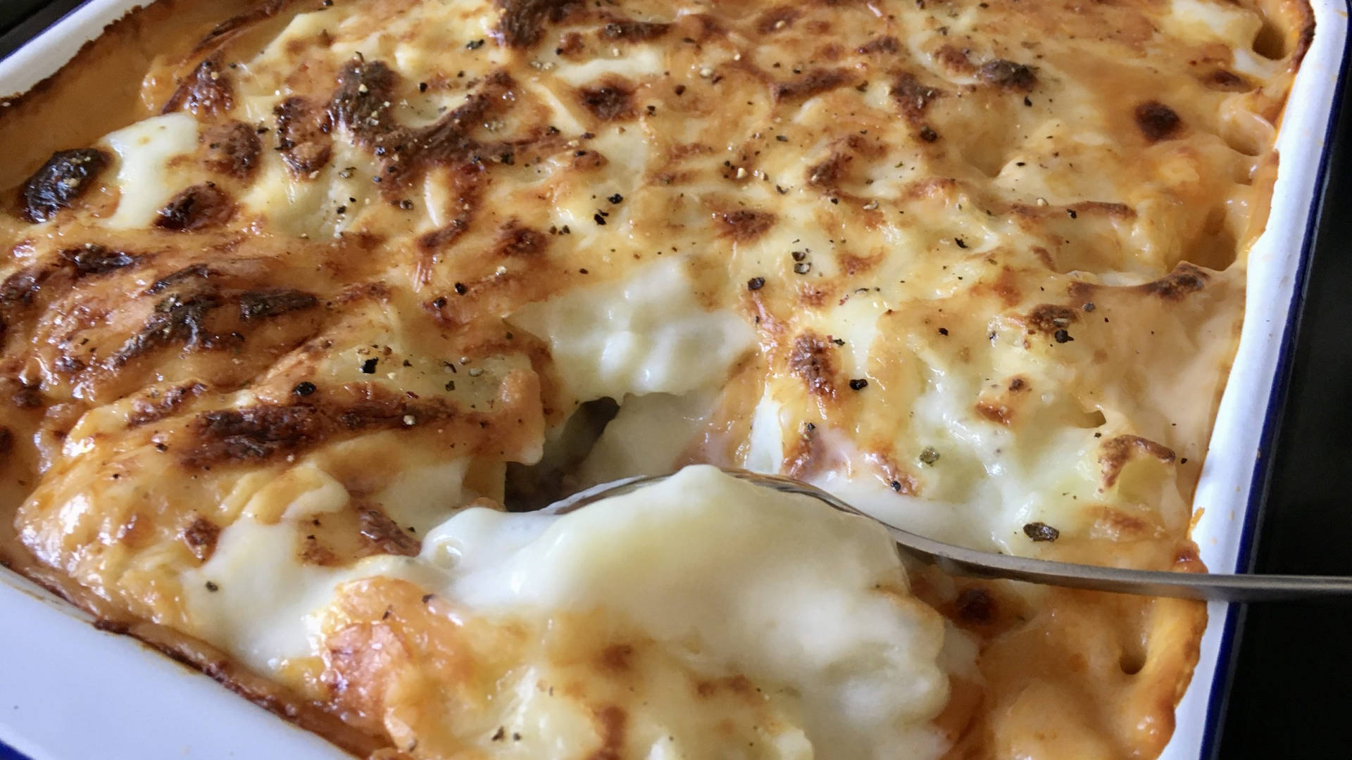 Delicious Tray Of Moussaka- For Meanings Of Comfort Food. Background