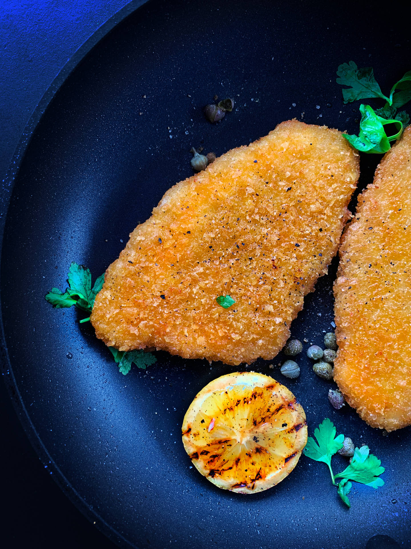 Delicious Wiener Schnitzel With Herbs Background