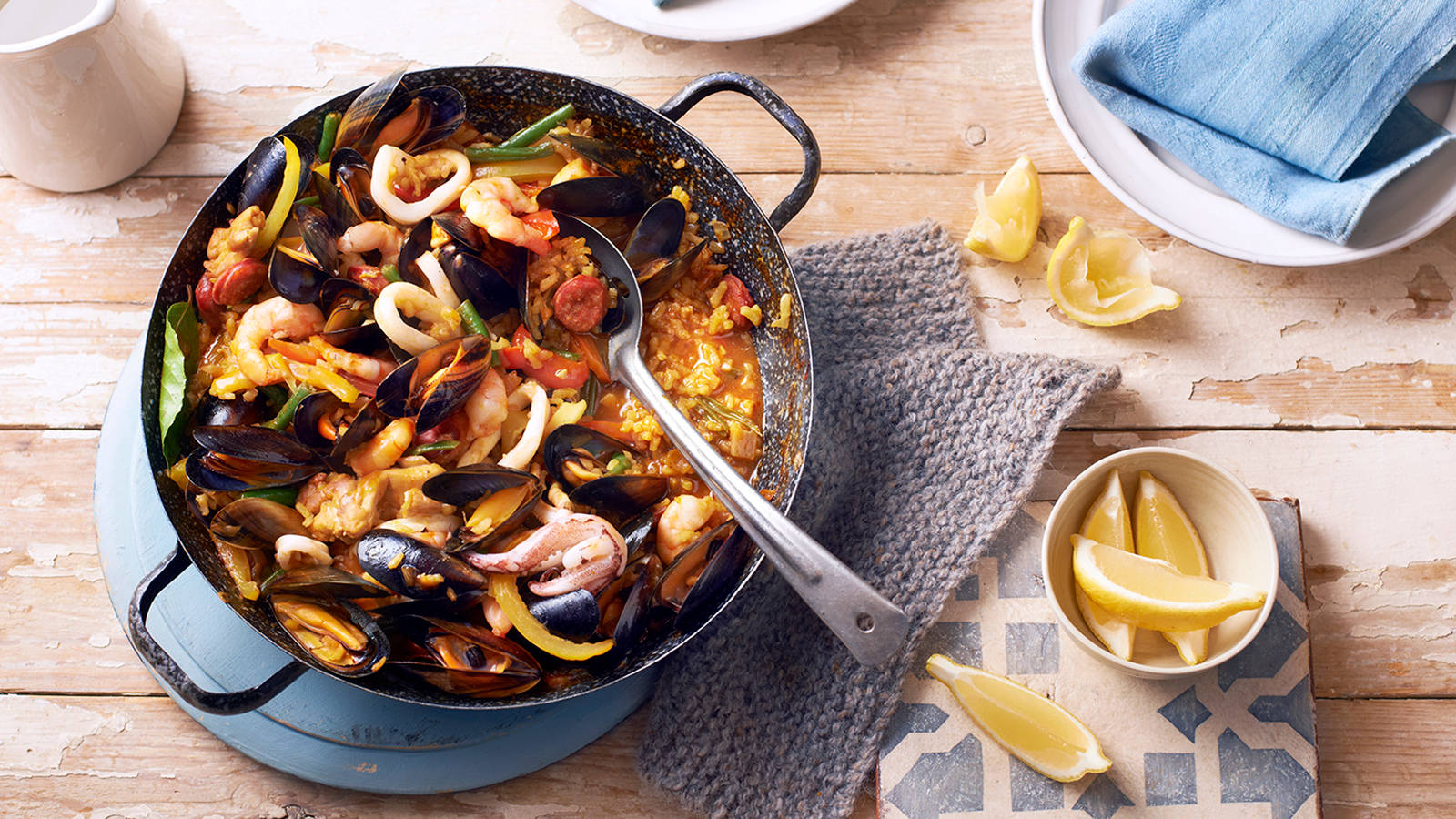 Deliciously Cooked Seafood Paella In A Pan Background