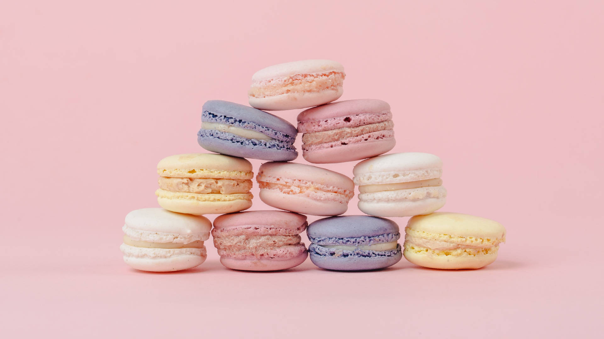 Deliciously Soft & Sweet Pastel Macaroon Pyramids Background