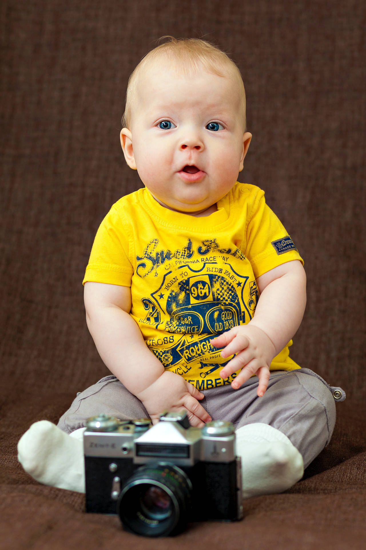Delightful Baby Boy Exploring Photography Background