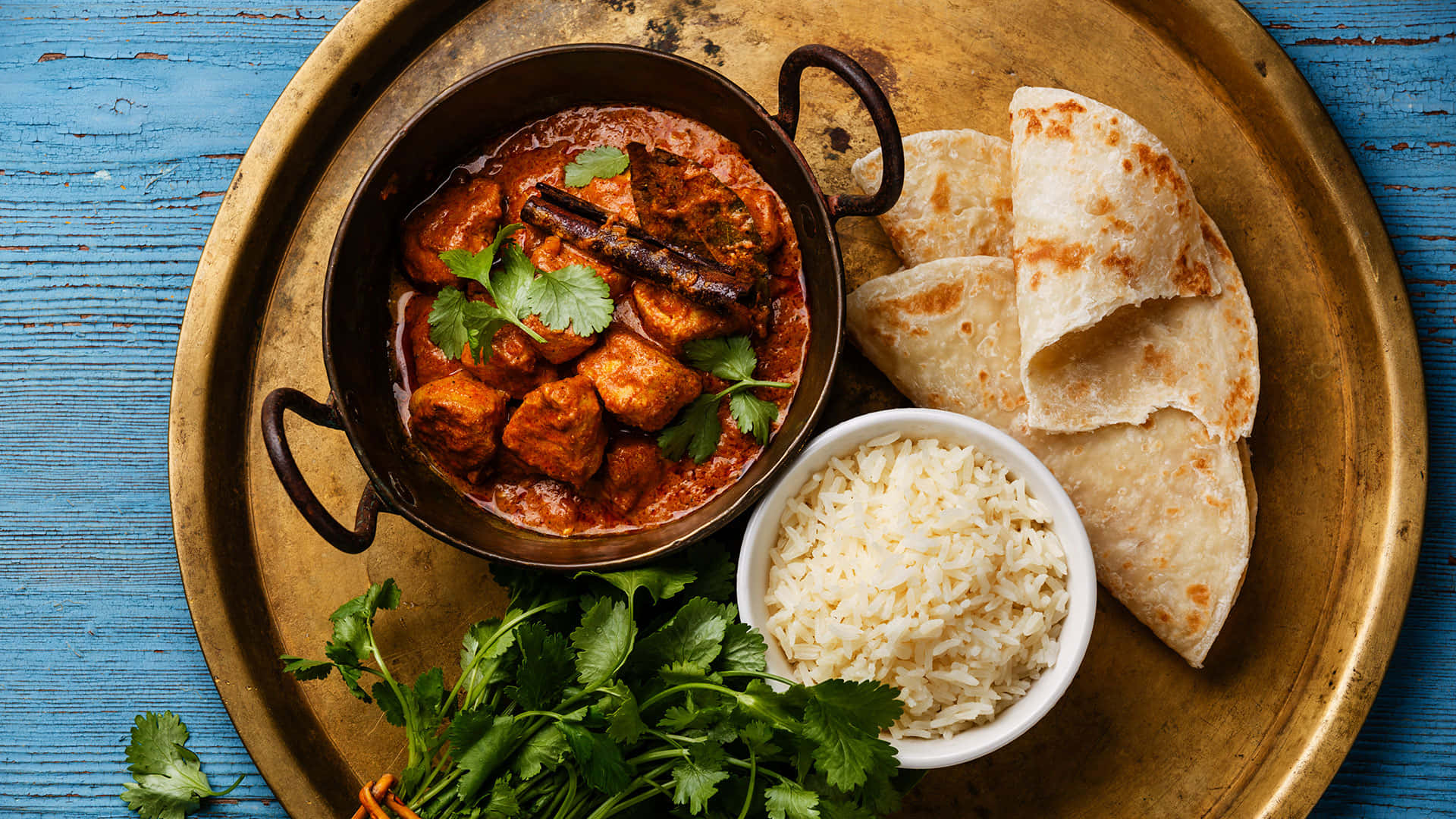 Delightful Chicken Tikka Masala With Flat Bread - Authentic Indian Cuisine Background