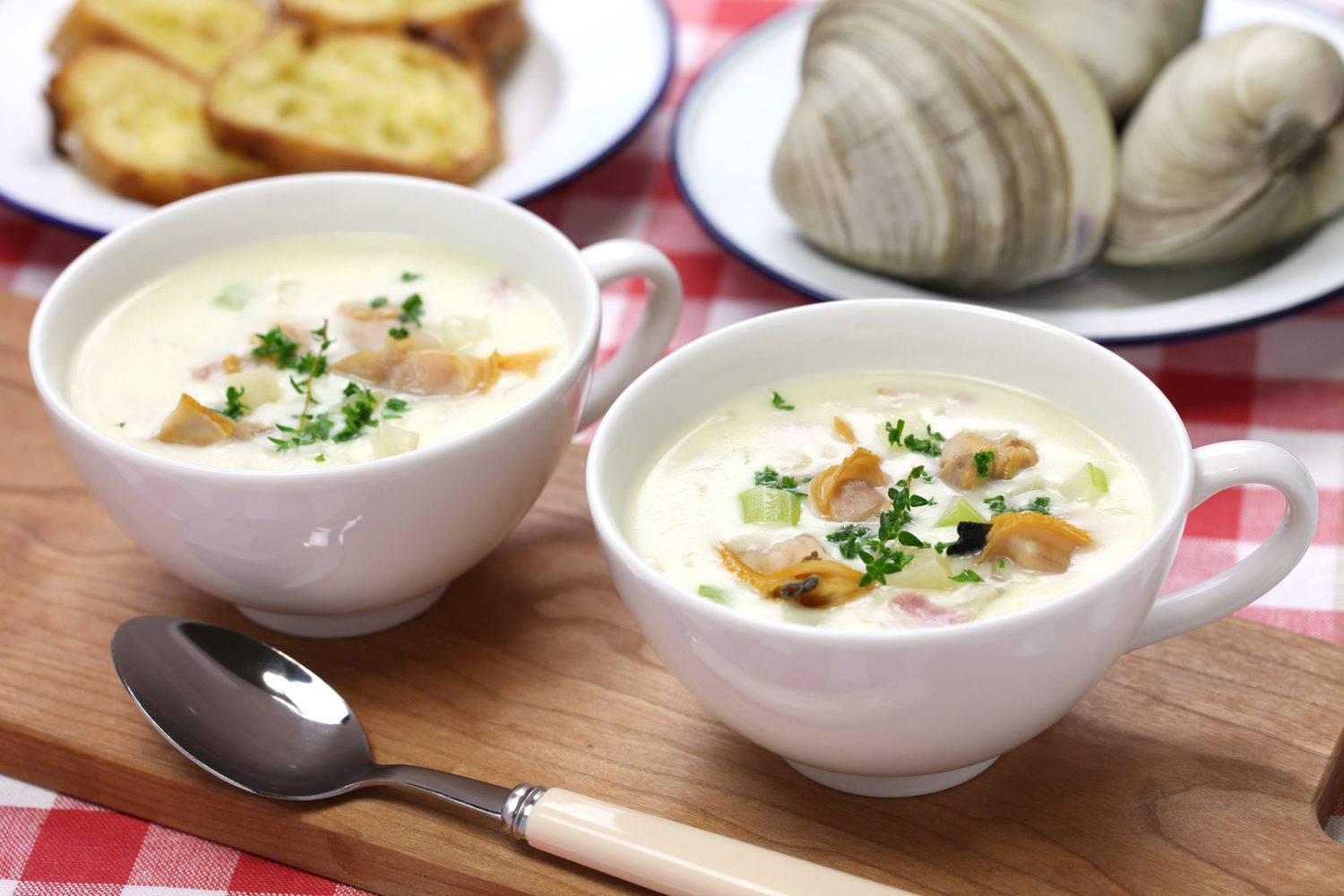 Delightful New England Clam Chowder With Toasted Bread Background