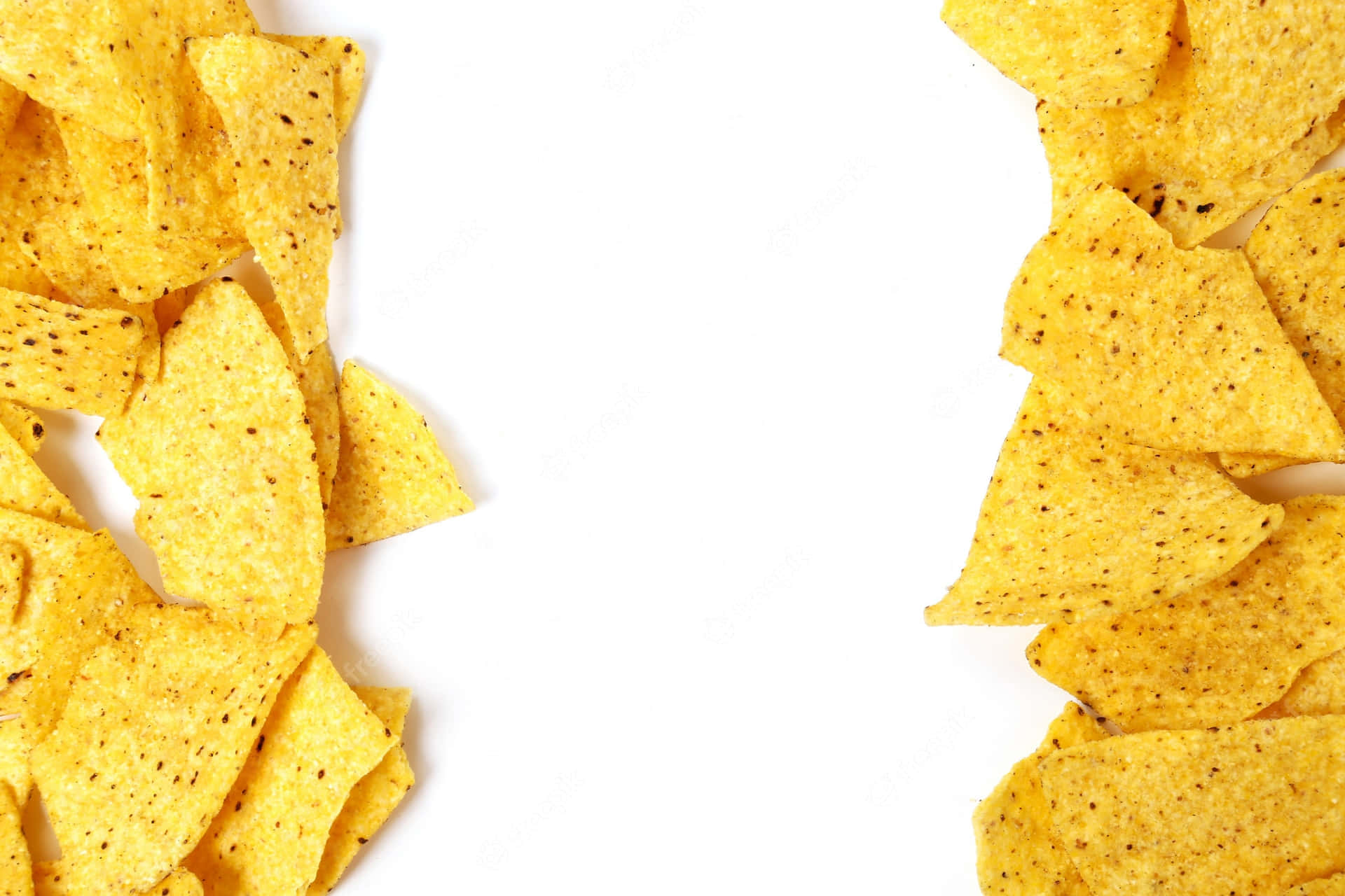 Delightful Spread Of Crunchy Tortilla Chips With Pepper Speckles