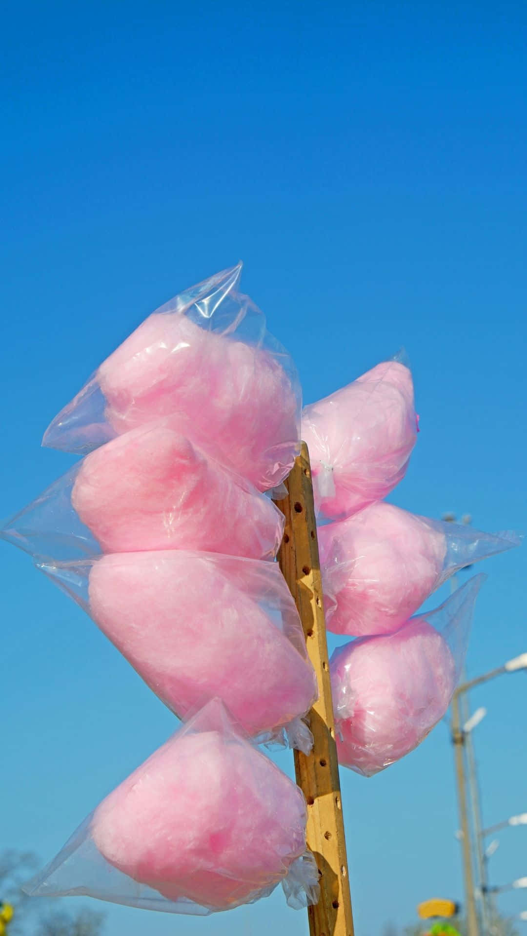 Delightful Swirls Of Cotton Candy In Vibrant Colors Background