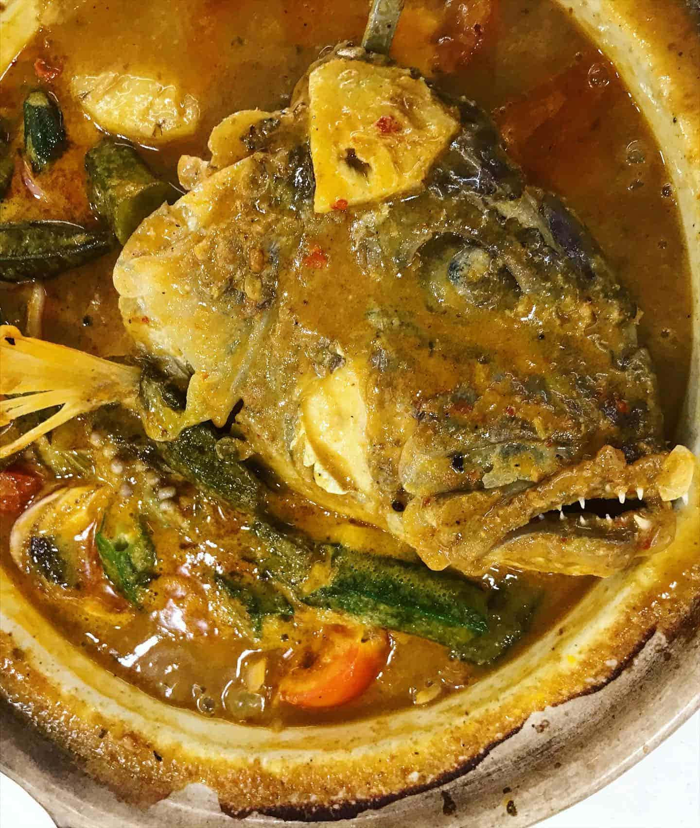 Delightfully Savory Fish Head Curry Background