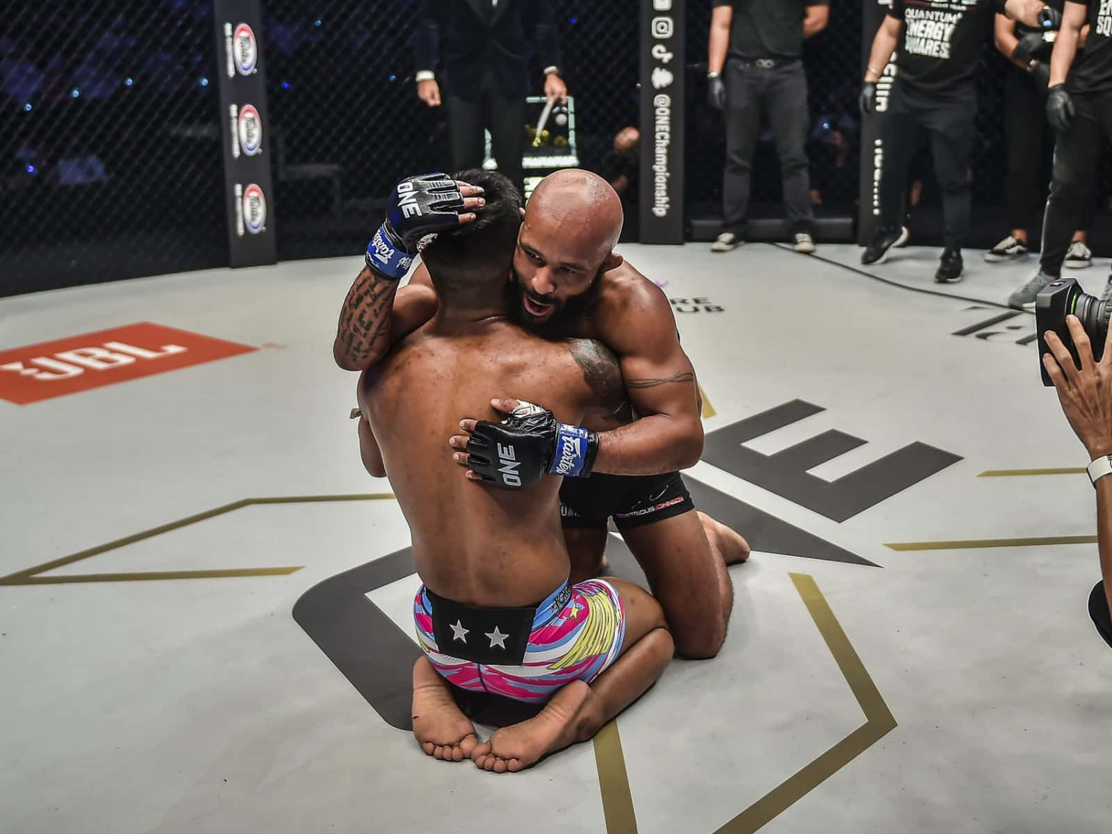 Demetrious Johnson And Rodtang Jitmuangnon Mma Muay Thai Match Background