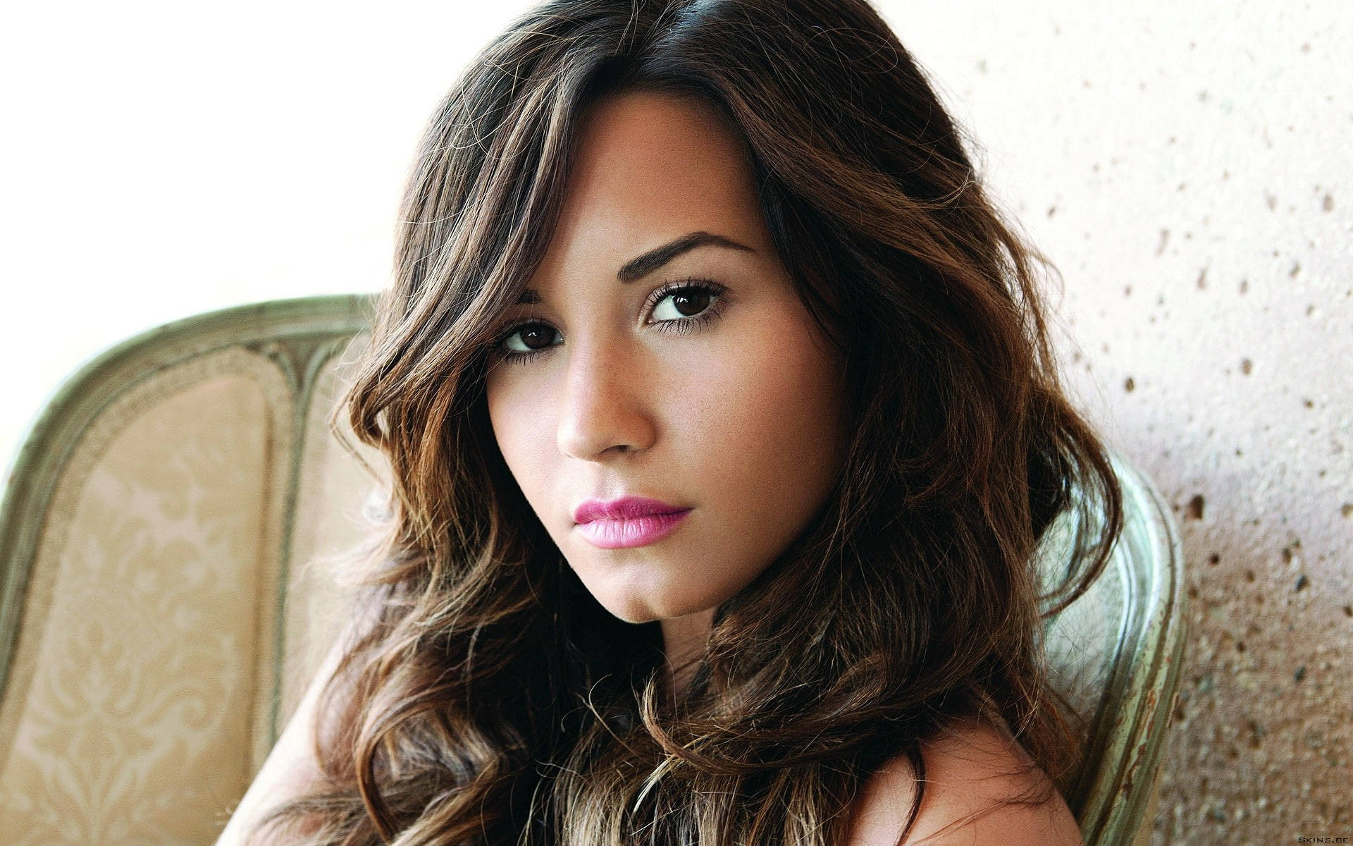 Demi Lovato Serious Look Background